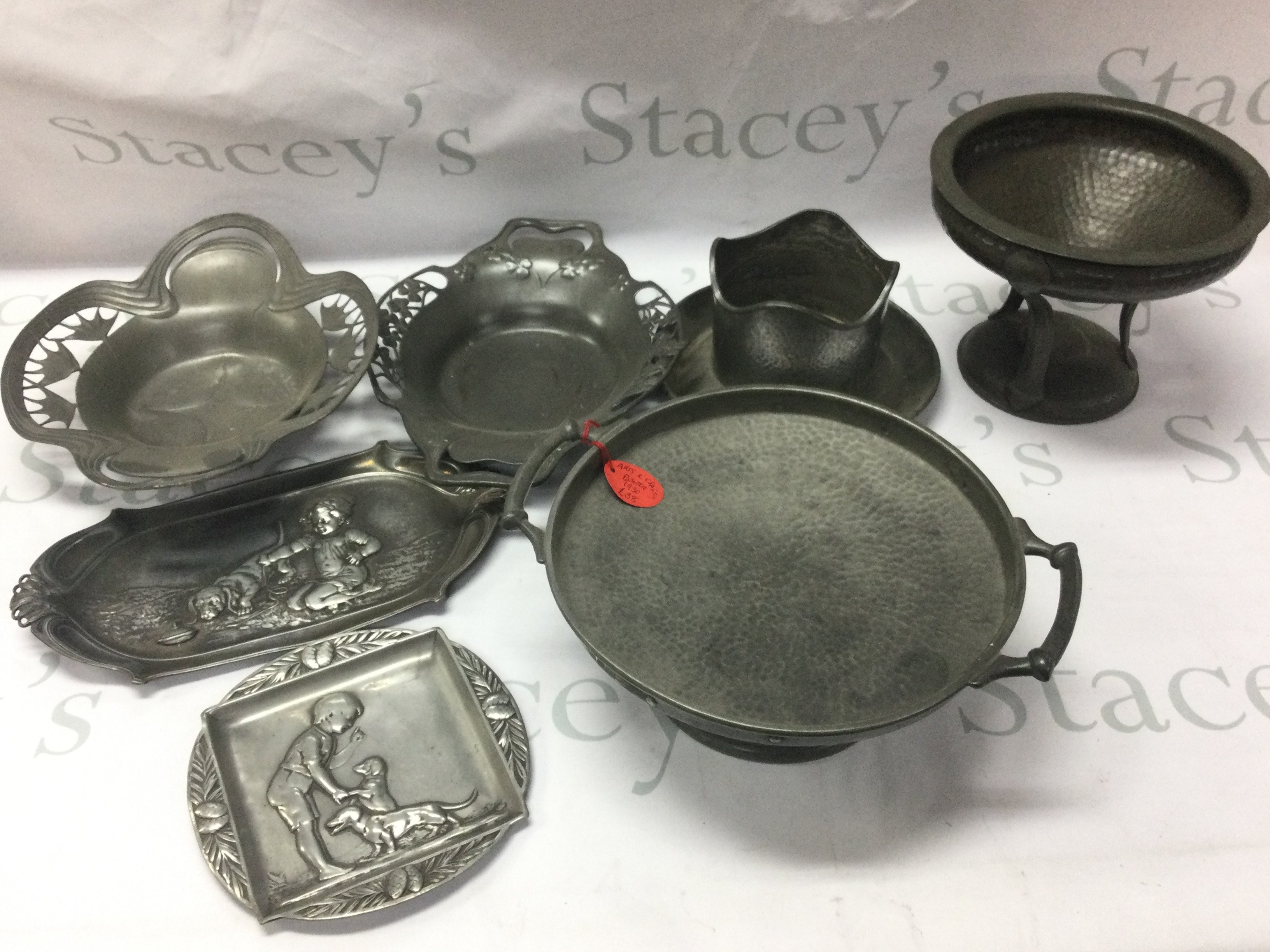 A collection of pewter dishes and other including Tudino . Postage category C