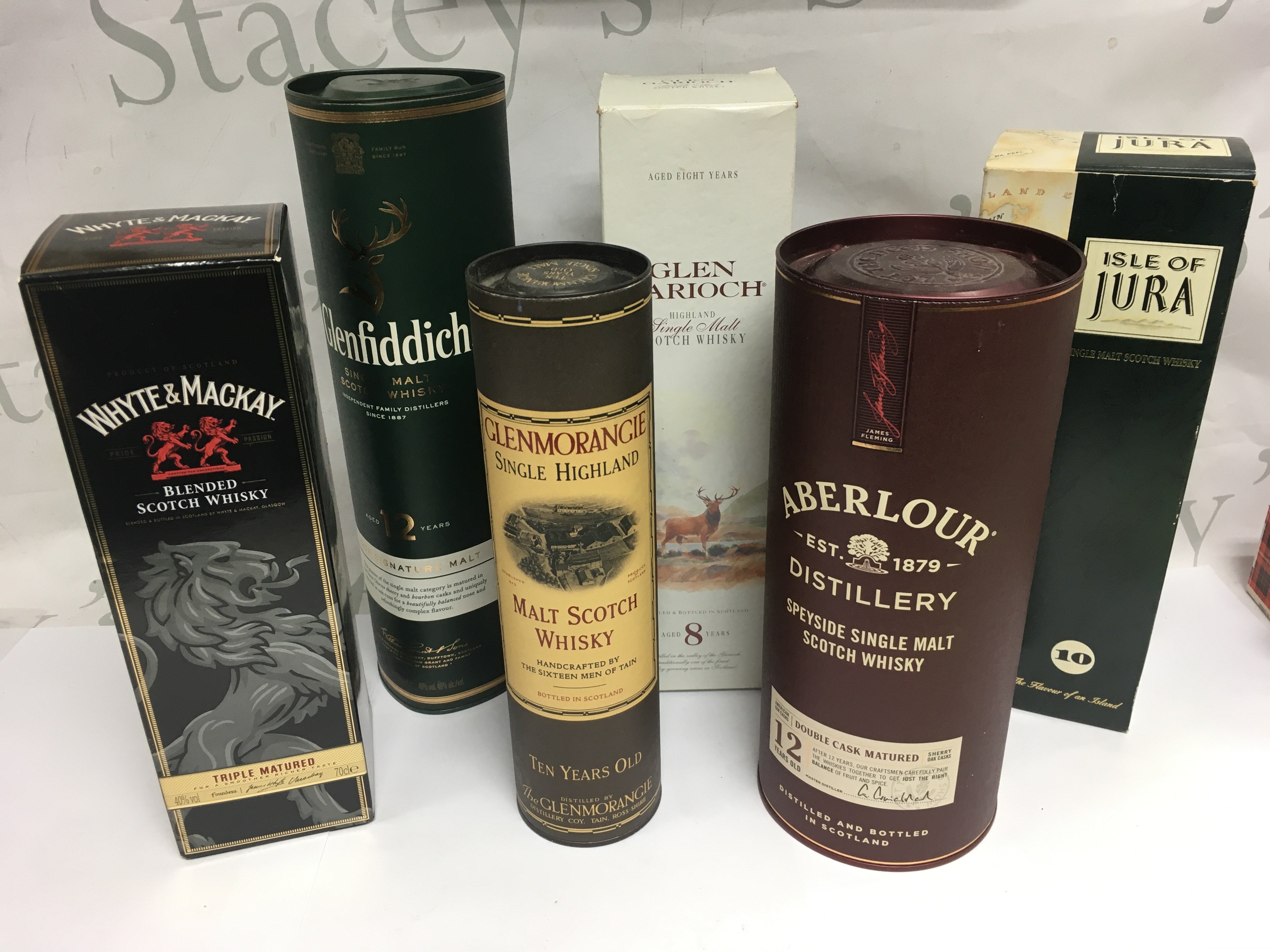 Six bottles of Whiskey comprising five single malt examples plus a collection of miniature whiskeys and one port. Shipping category D.