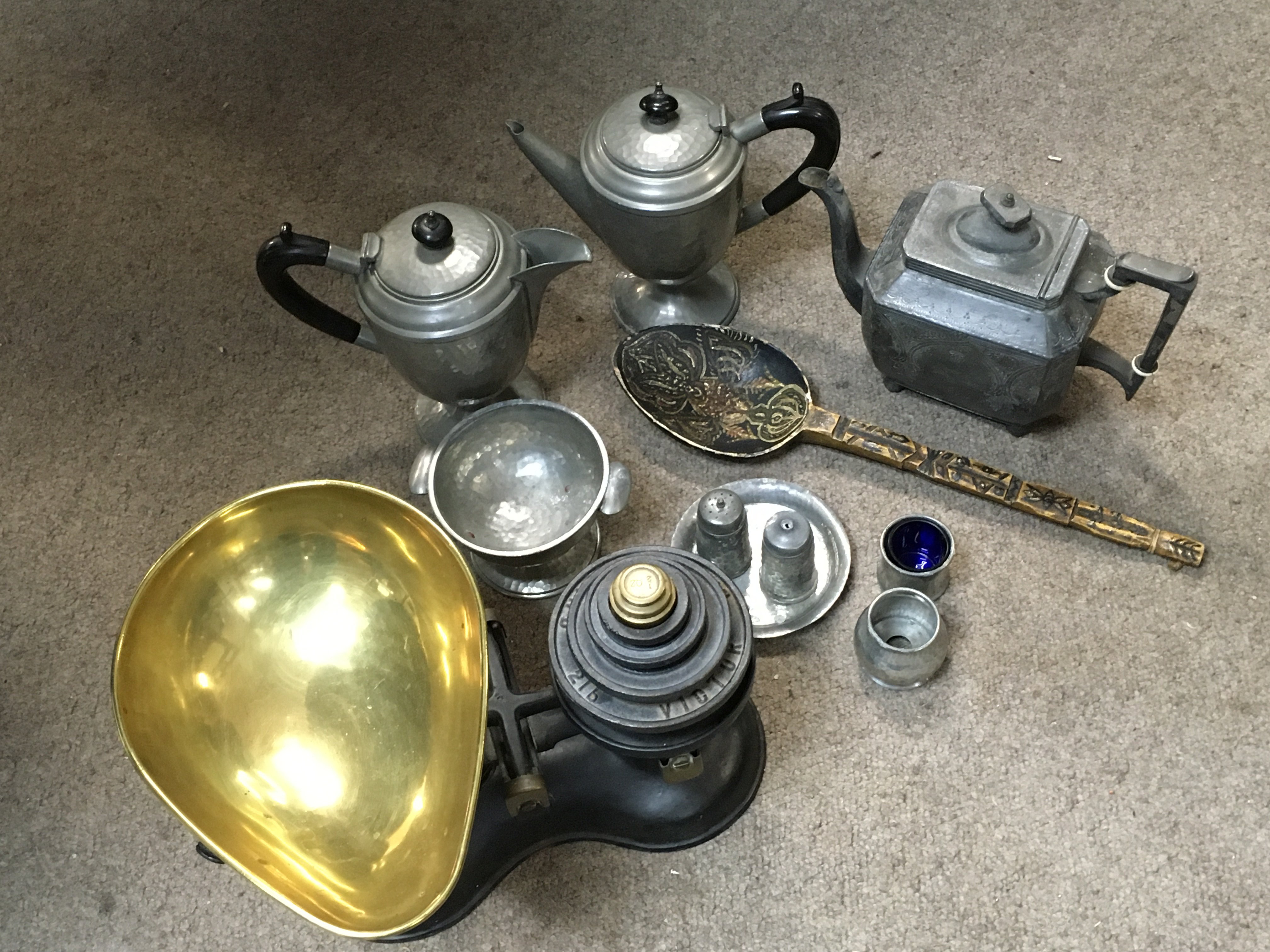 Pewter oddments , set of scales, carved wooden spoon. Postage category c