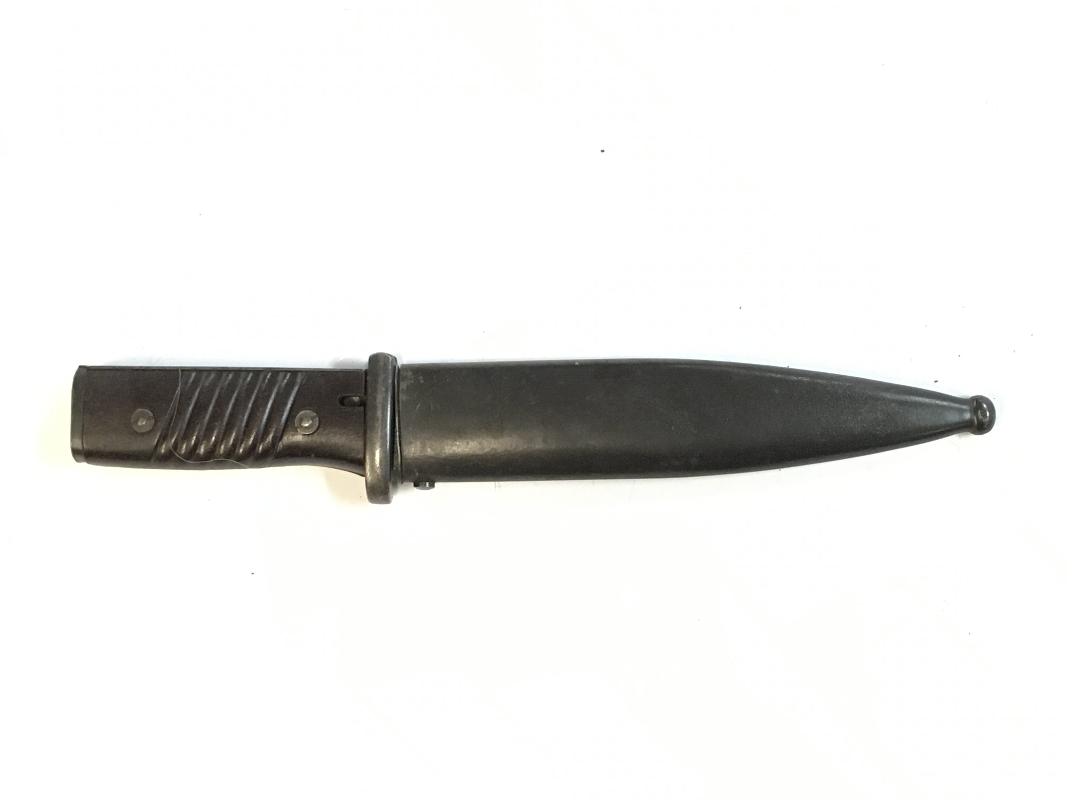 A WW2 German Third Reich combat knife made from a K98 bayonet. Blade 14cm , Total length 25cm approximately . This lot cannot be posted