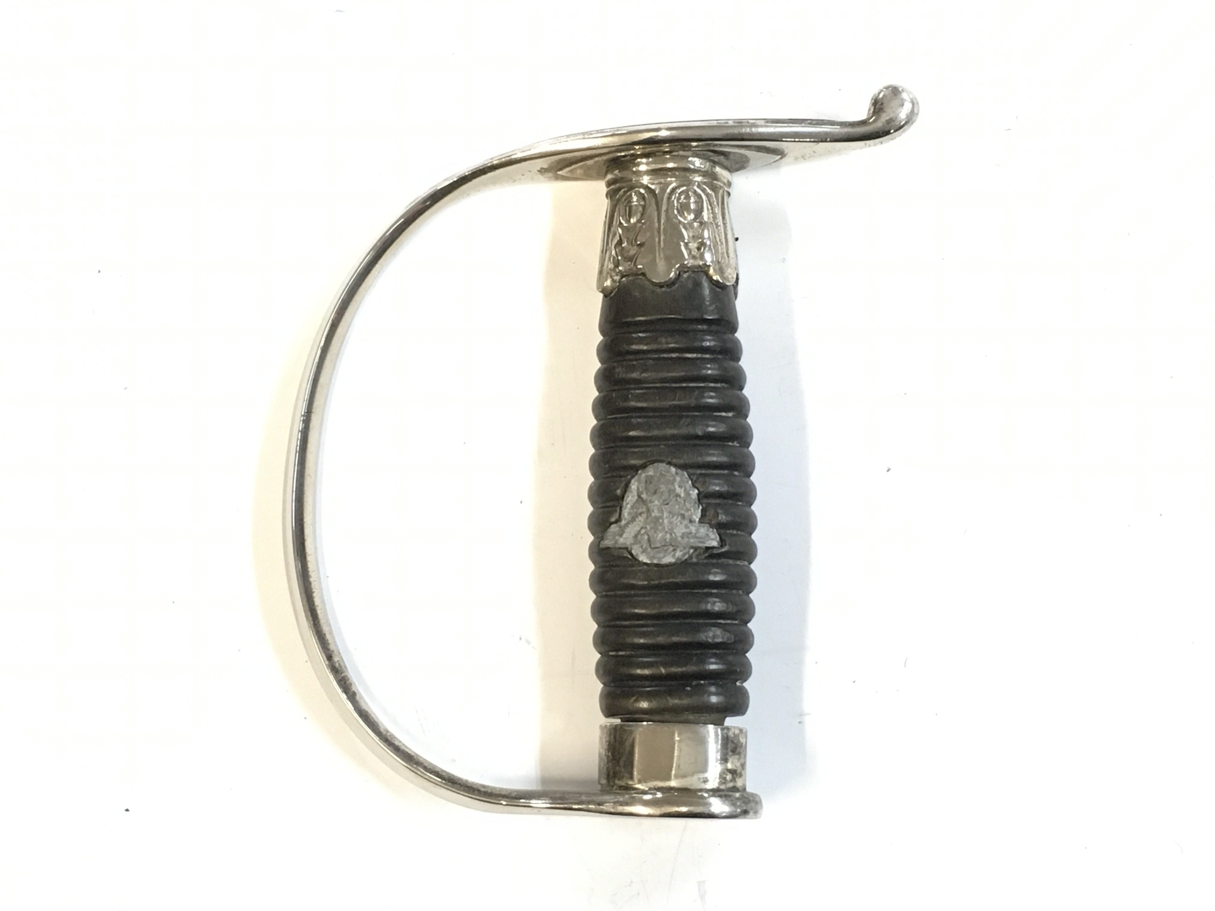 The Grip and knucklebow for a third Reich police subordinates sword with grey metal grip eagle. Postage category A