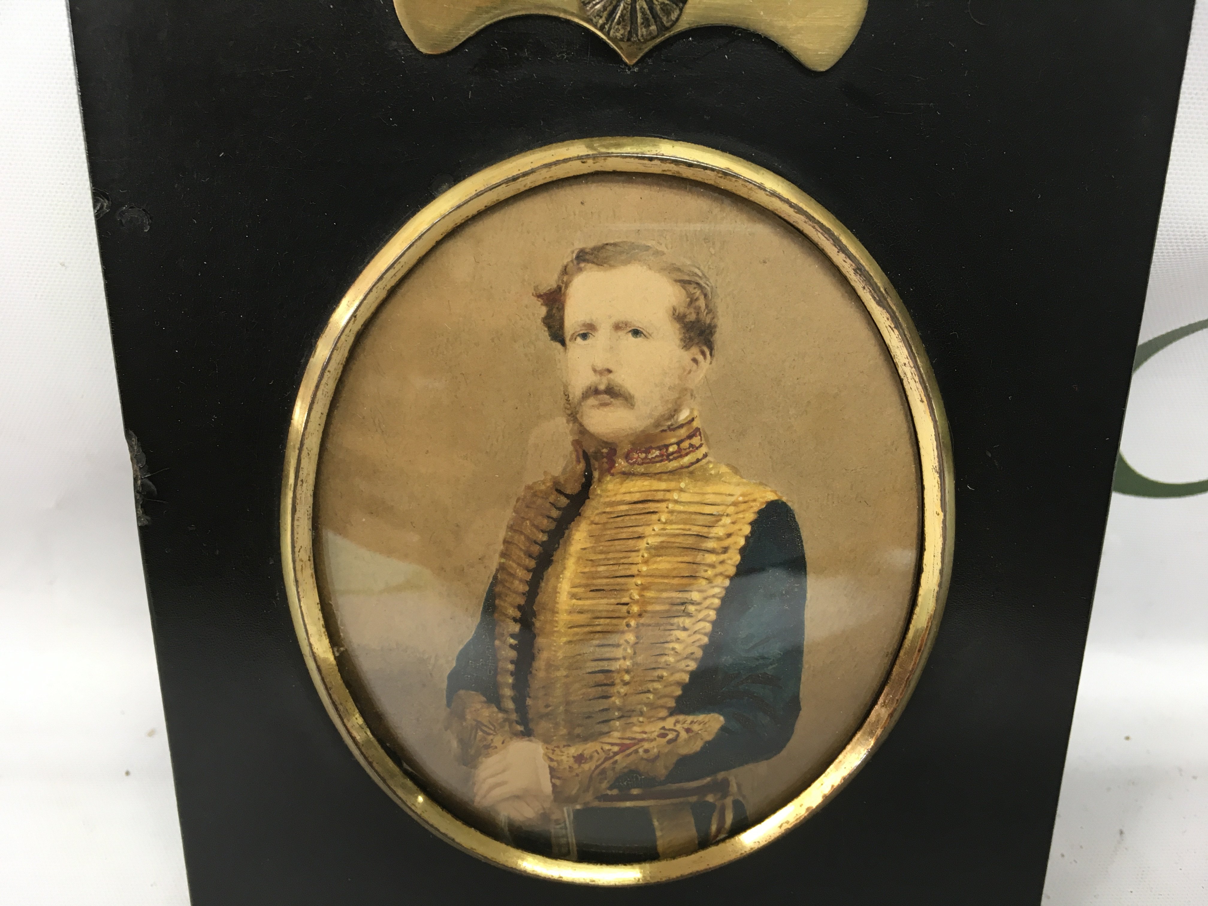 A framed ebonised photograph portrait of a gentleman in military dress. NO RESERVE