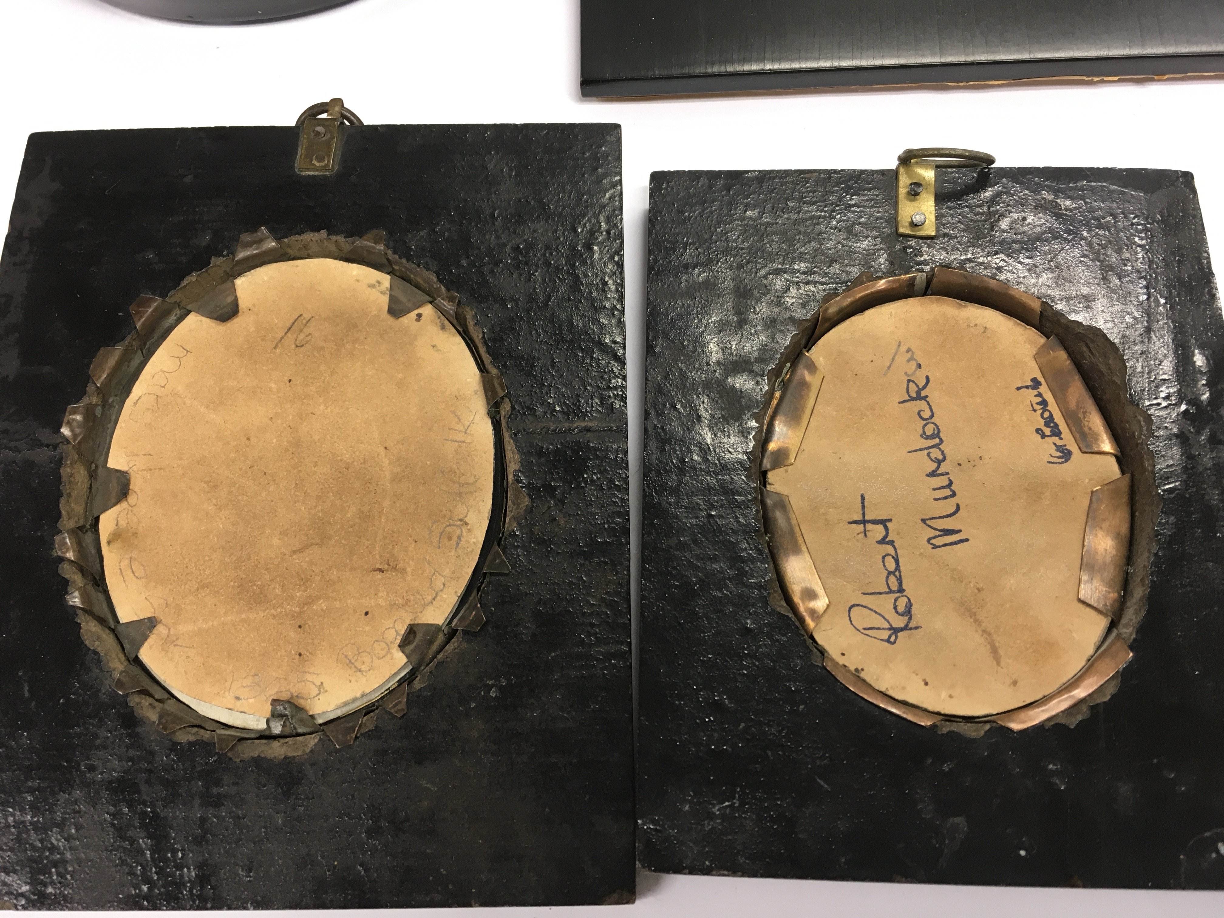 A framed waxed portrait minature by Lesley Ray, together with two framed silhouettes and two Georgian miniatures