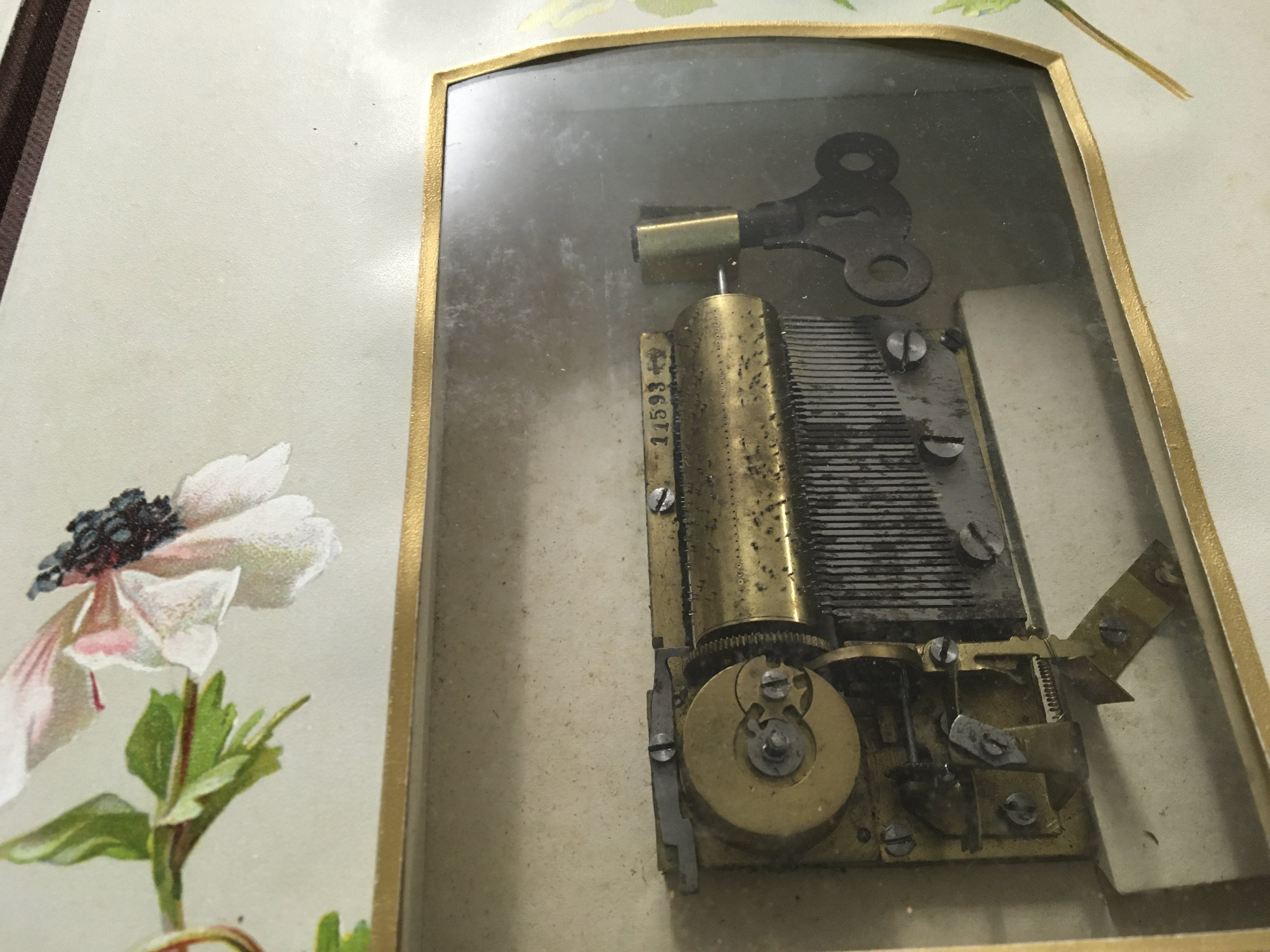 A Victorian photo Album inset with a music box .- NO RESERVE