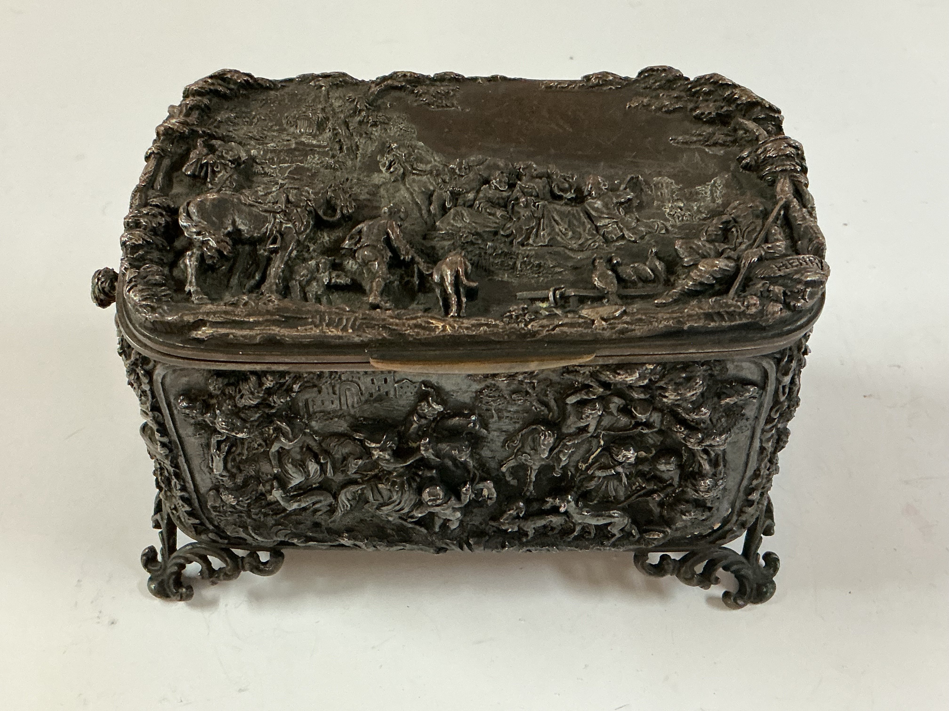 A 19th Century French silvered copper trinket box with repouse panel decoration. 13.5cm x 8cm x 9cm.