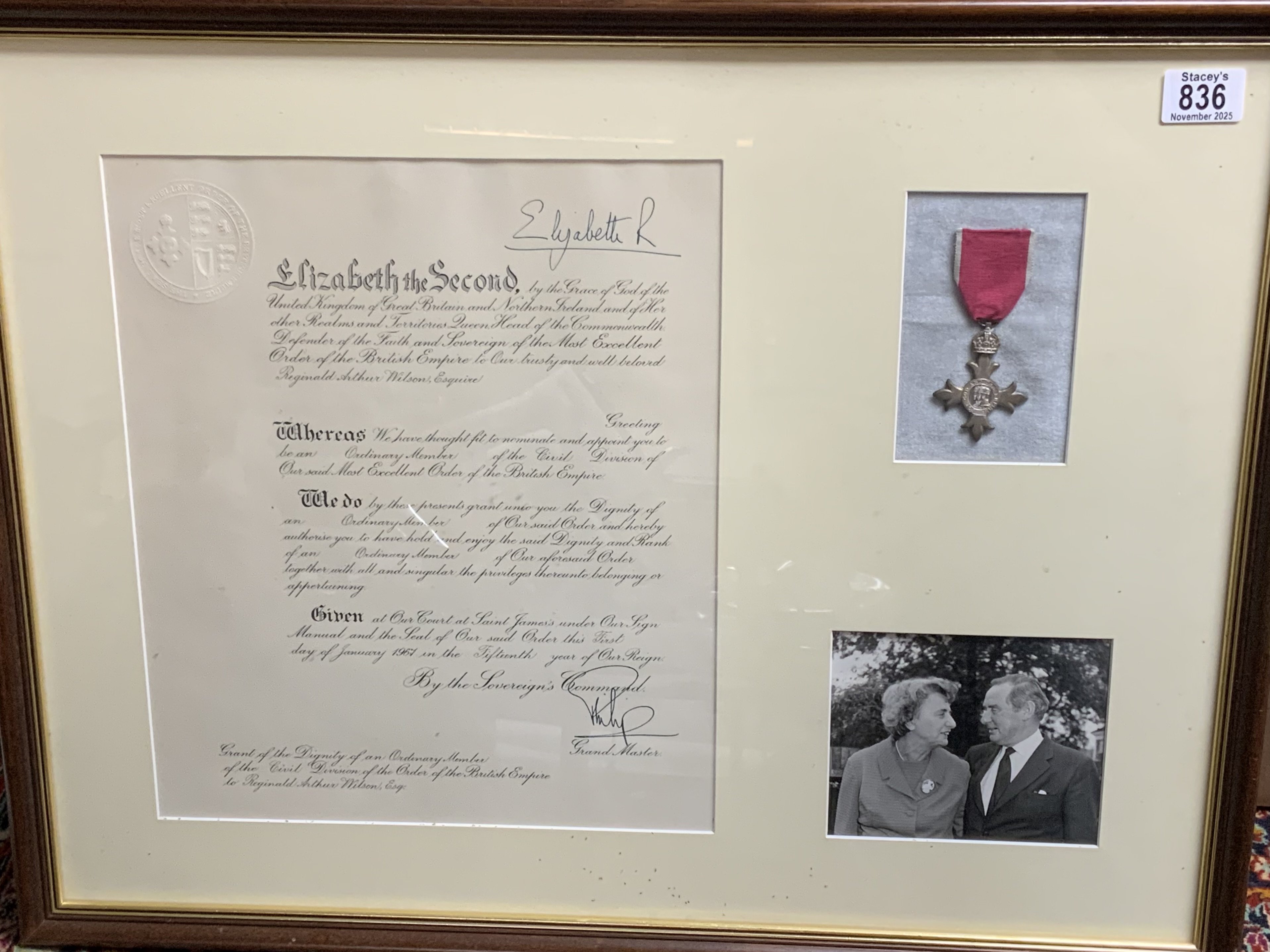 A Framed Civilian MBE awarded to Reginald Arthur Wilson for his works with TMT (The Migrane Trust) January 1967. (D)