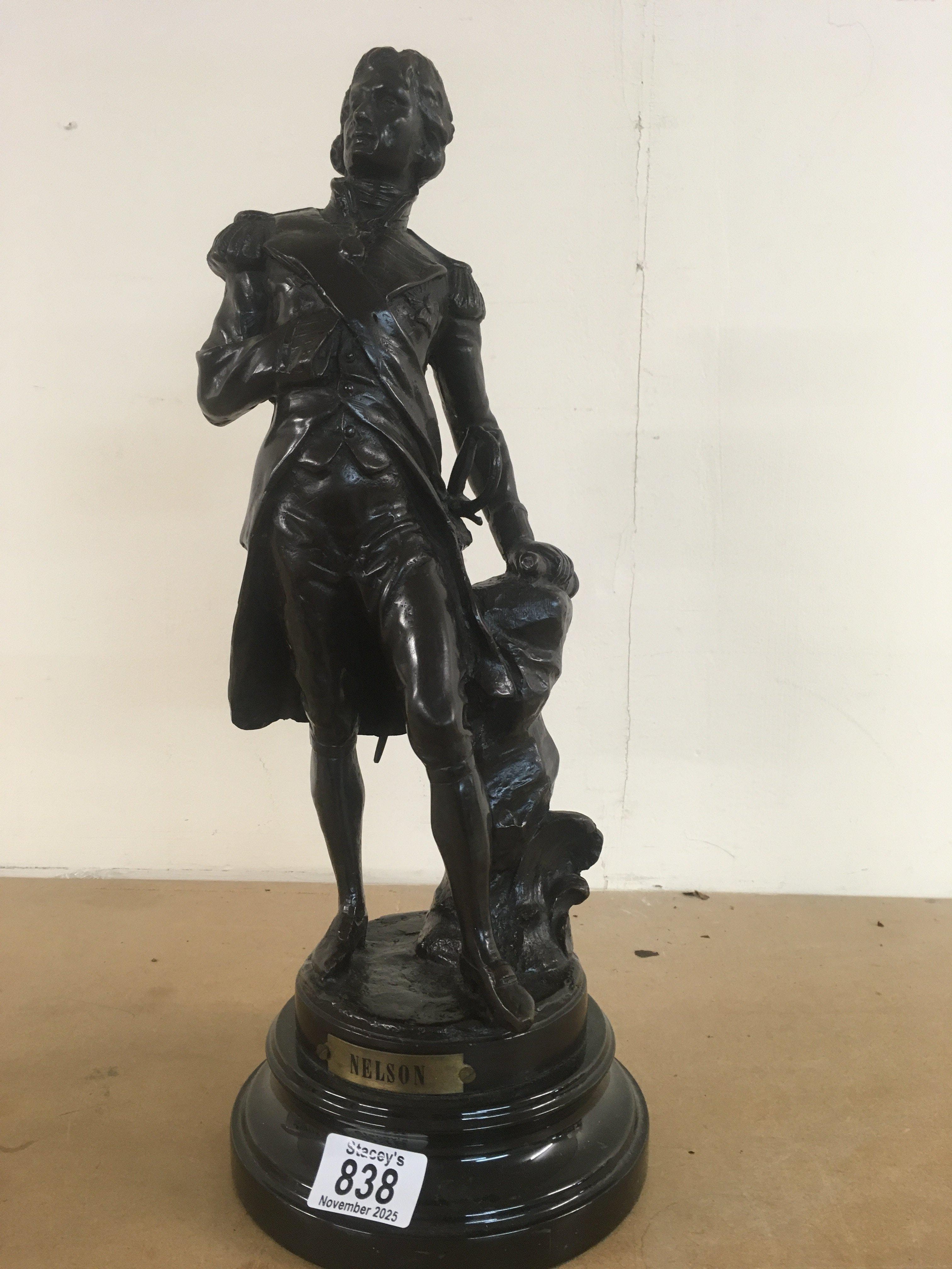 A bronzed figure of Nelson on A marble base .44 cm