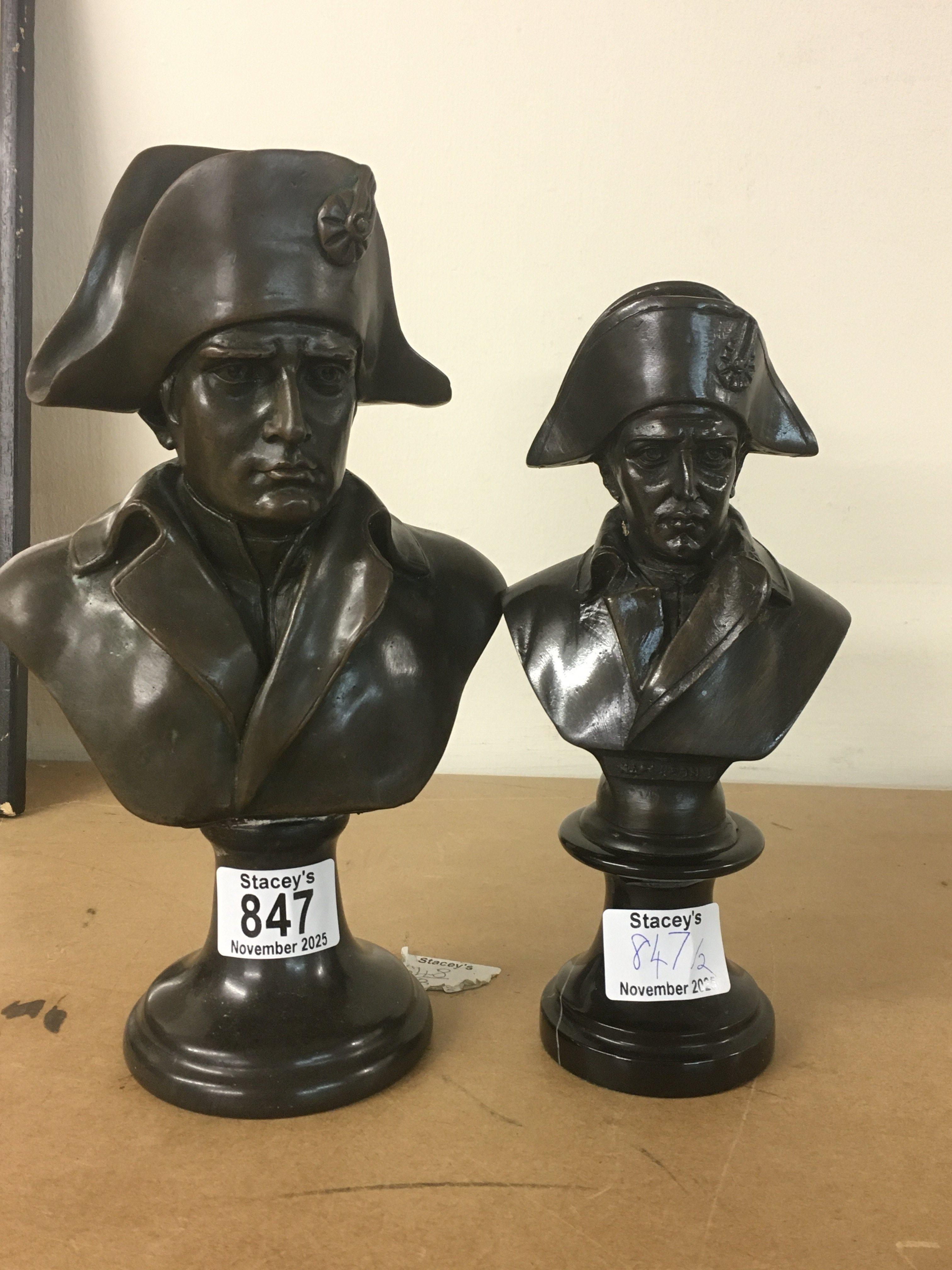 Two bronzed busts in the form of Napoleon.