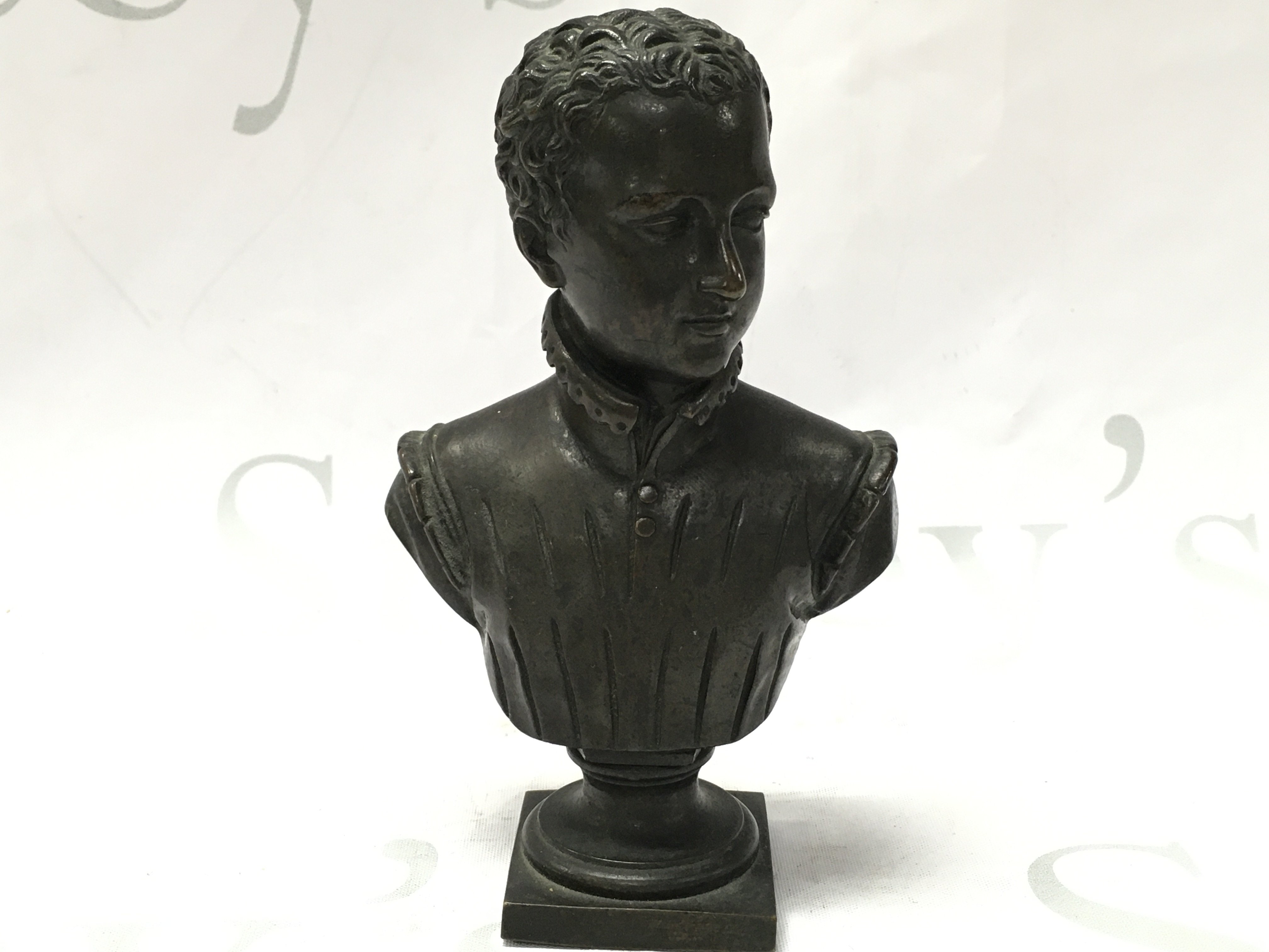 A bronze bust of young Henry IV of France . 15cm tall. Postage category A