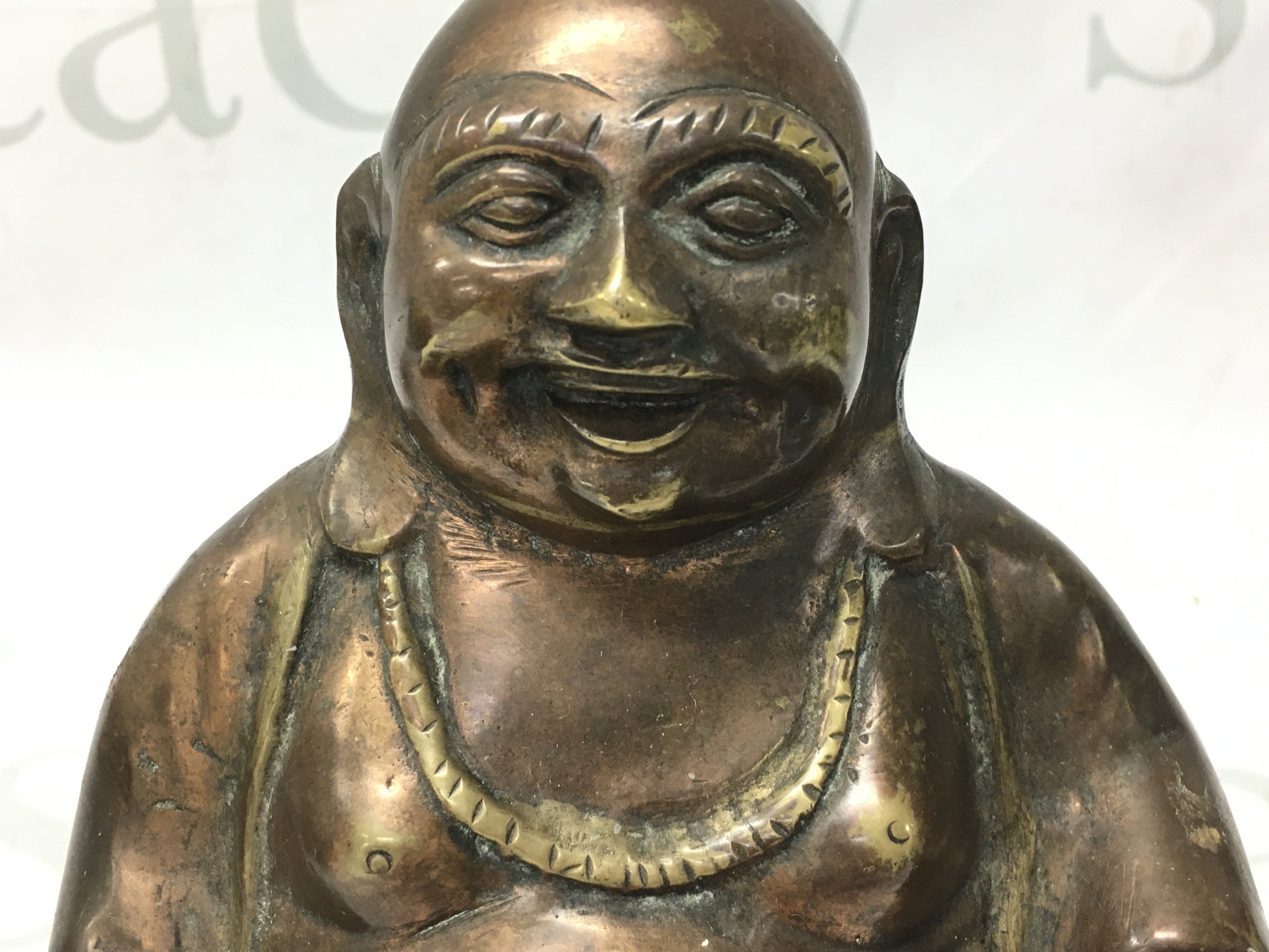 A Chinese bronze Buddha figure , 14cm tall. Postage category B