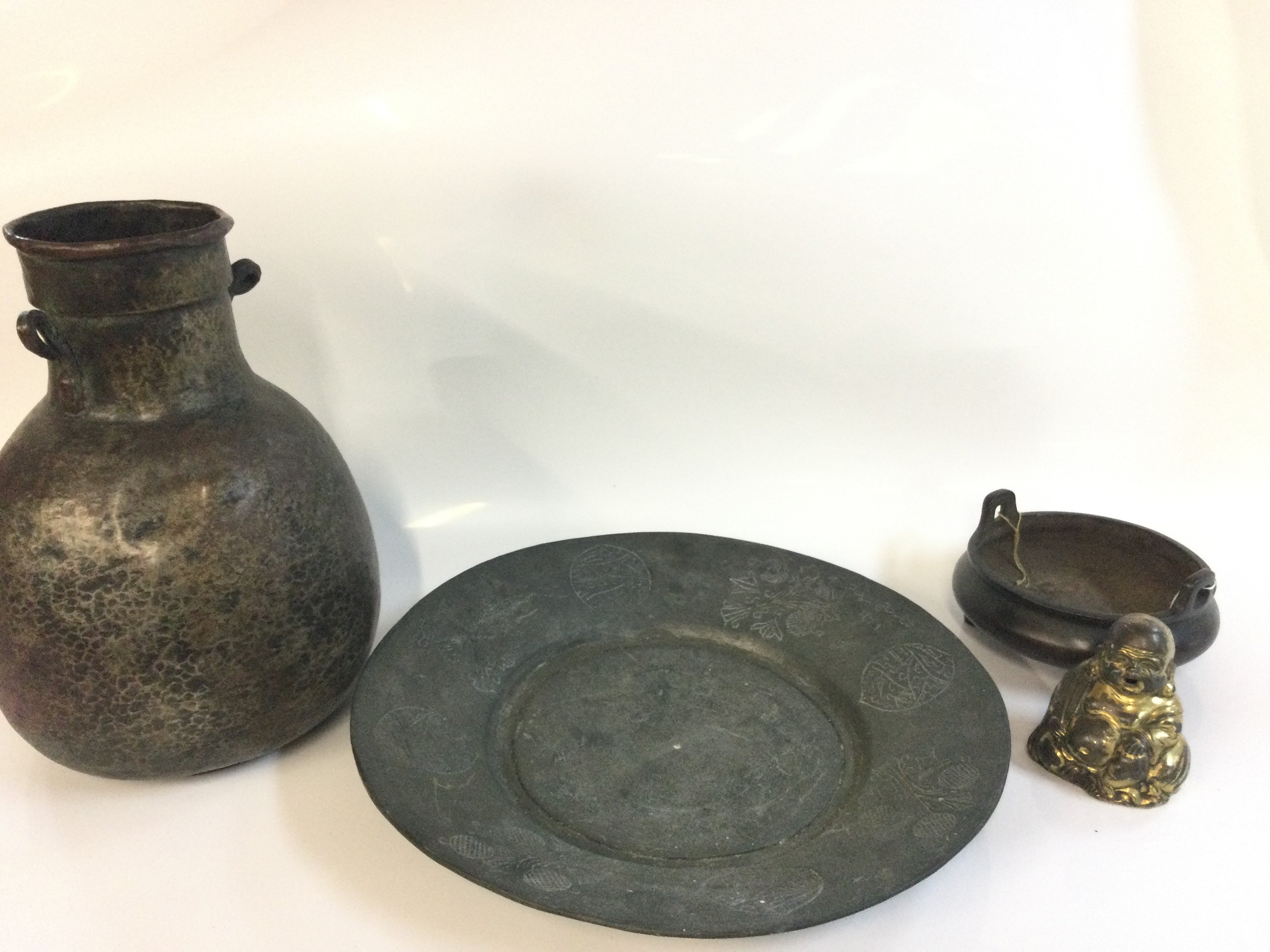 Chinese items including a charger, silvered copper large jug, Buddha figure and an incense burner with six character mark at base, this lot cannot be posted