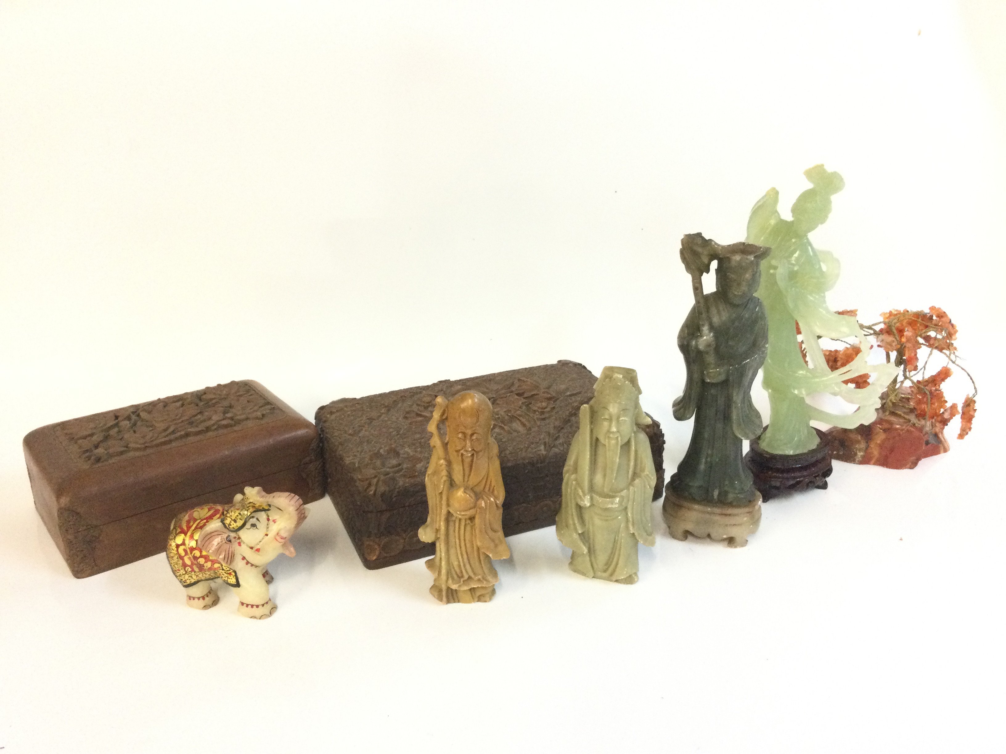 Chinese soapstone figures and carved trinket boxes. This lot cannot be posted