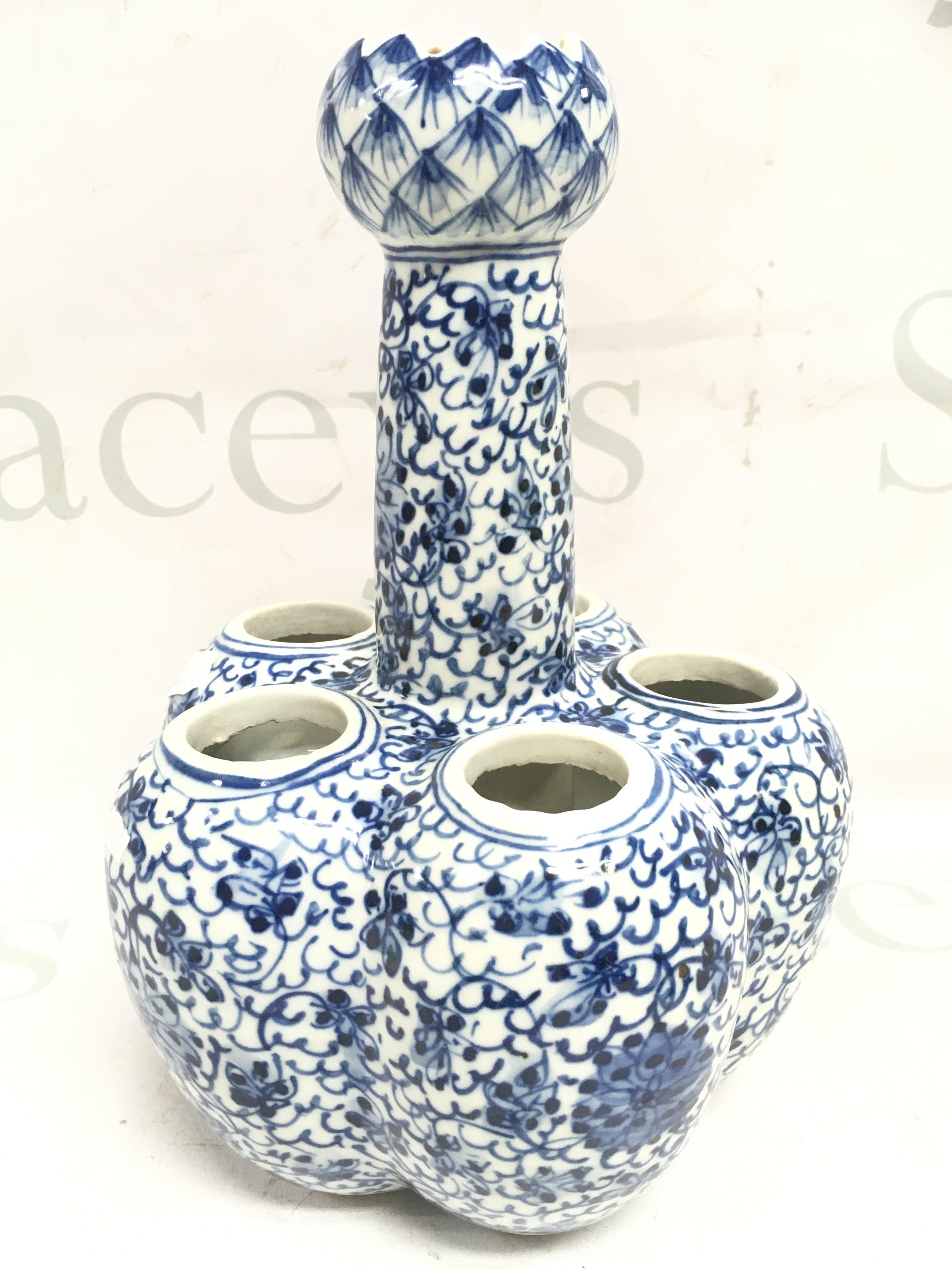 A Chinese blue and white porcelain tulip vase signed on base , 23cm high