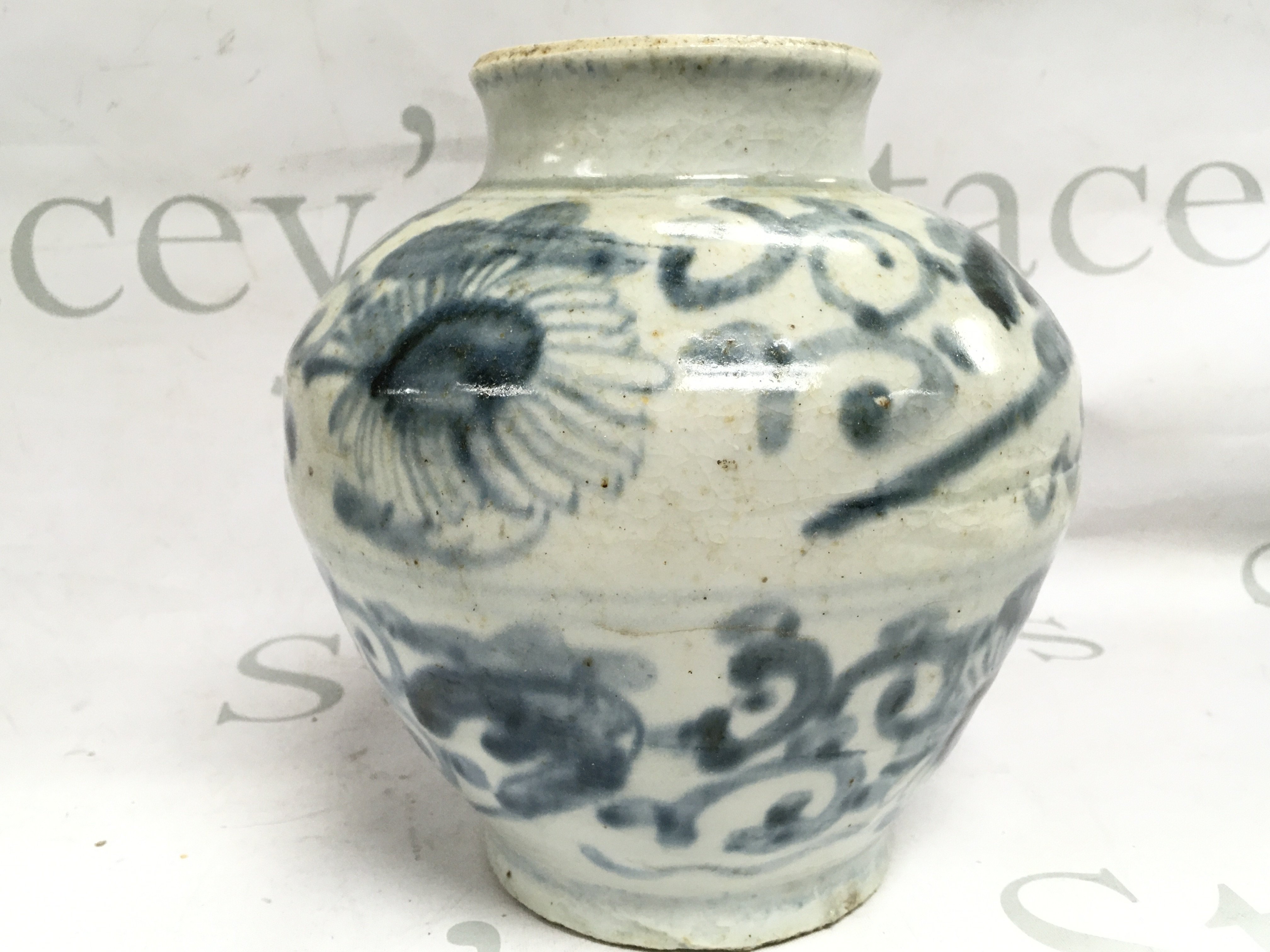 An antique Chinese Ming period jar , 7 inches tall. This lot cannot be posted