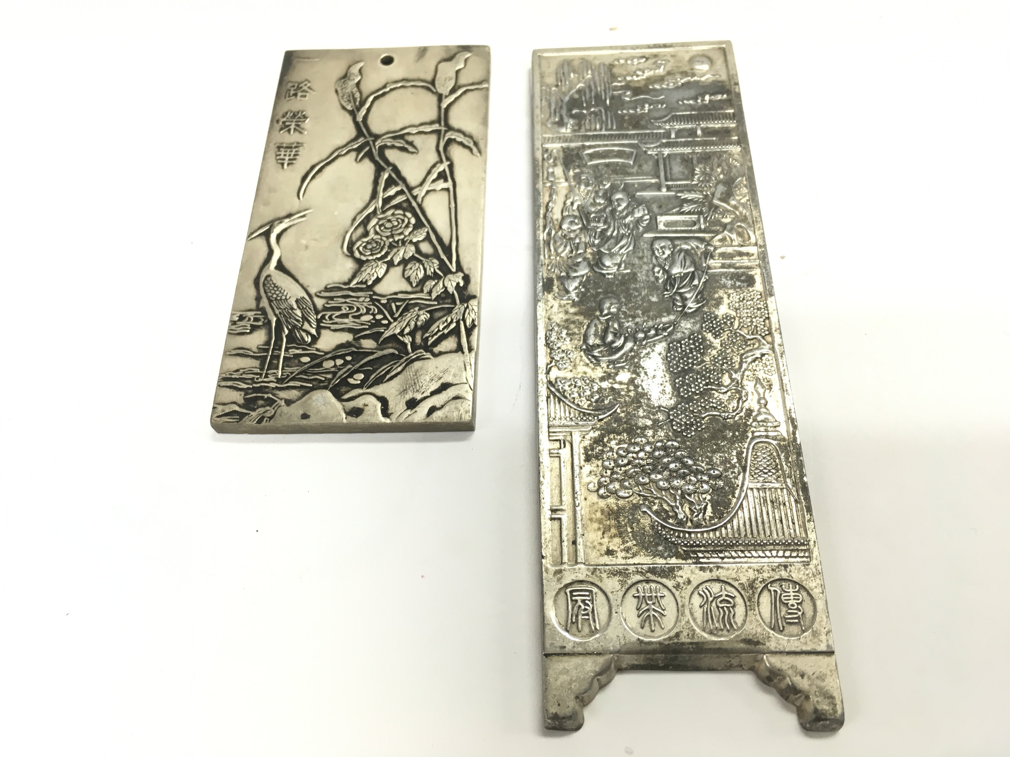 Two Chinese metal plaques , 10 and 17cm wide .postage category B