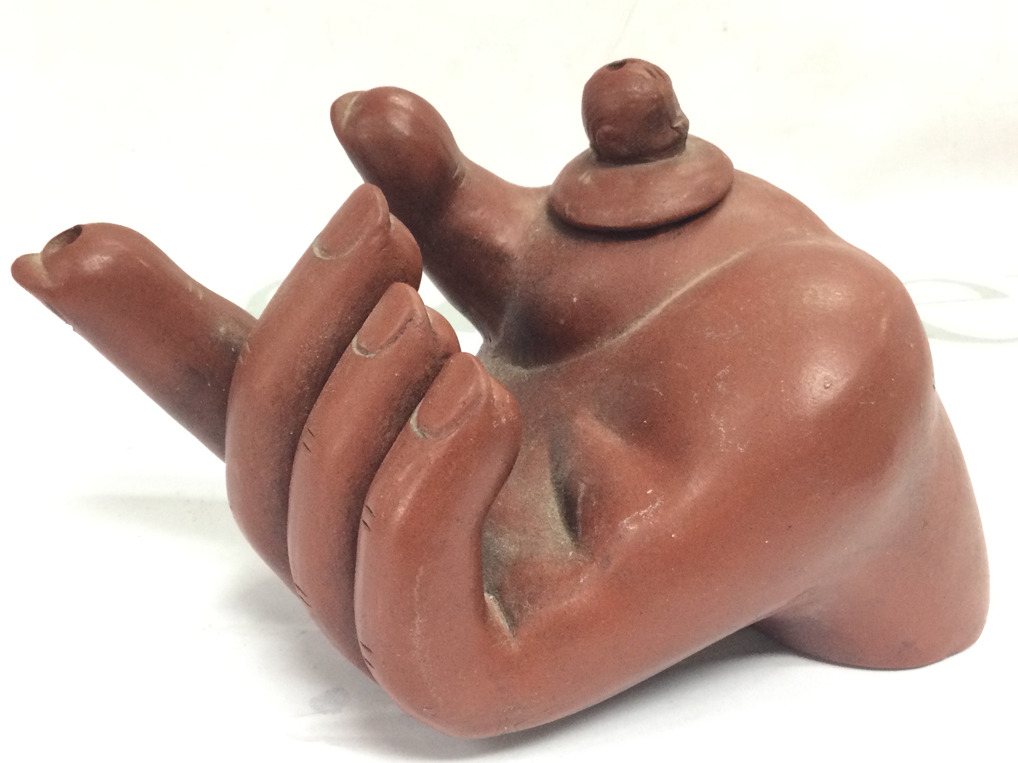 Yi-Xing terracotta water dropper in the form of a hand , 8cm tall . This lot cannot be posted