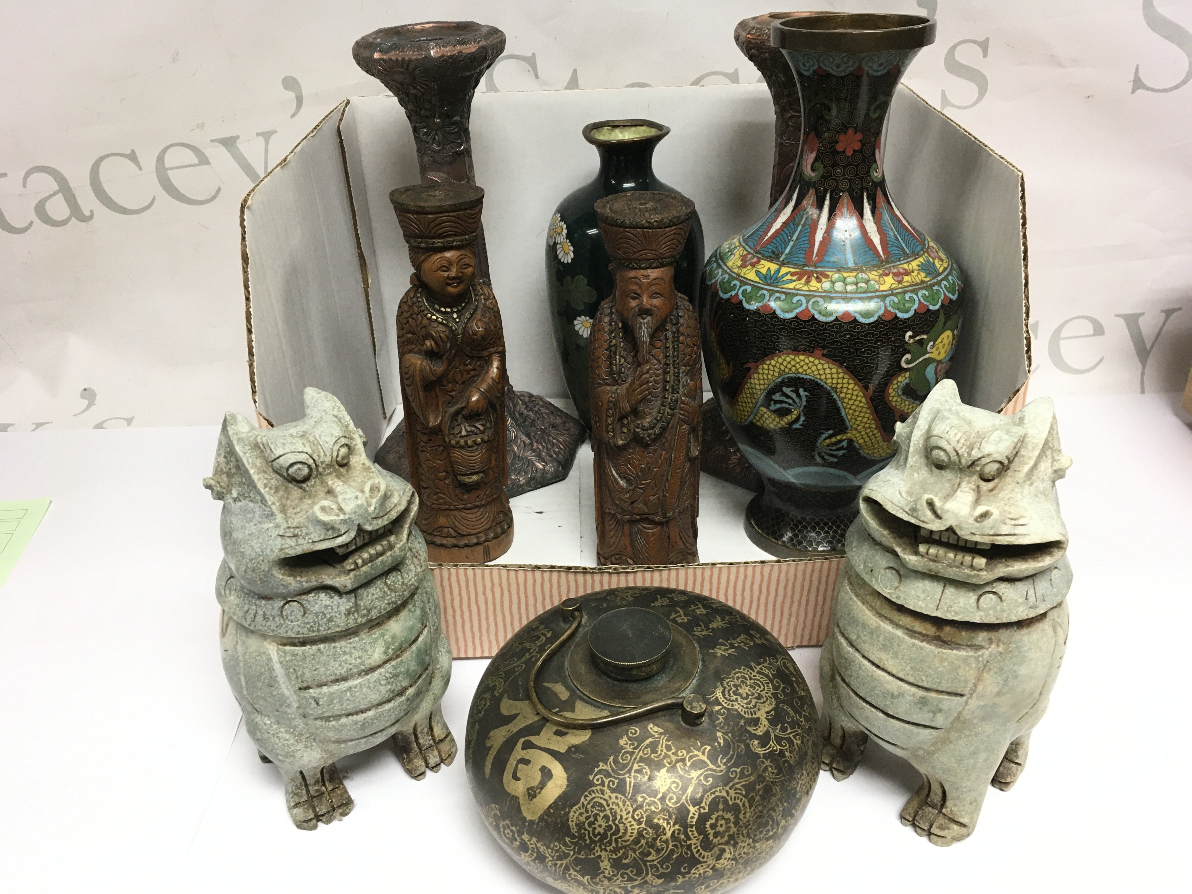 A collection of mixed Oriental items comprising Cloisonne vases a/f, wooden figures etc. Shipping category D.