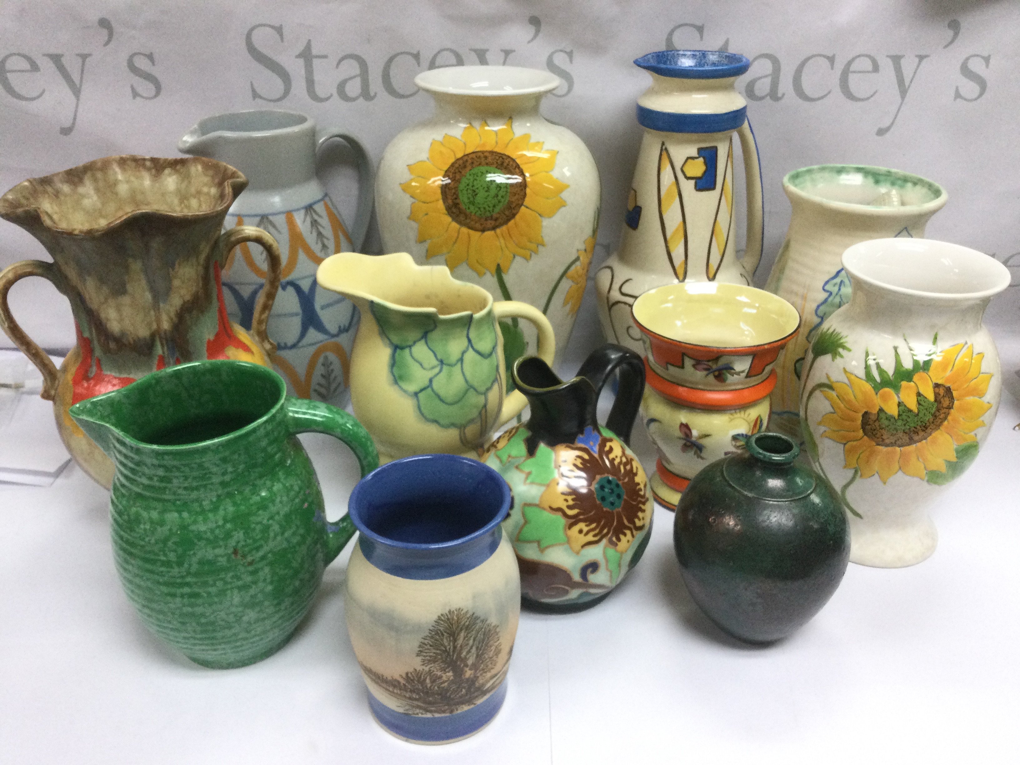 A collection of studio art pottery jugs and vases. Shipping category D.