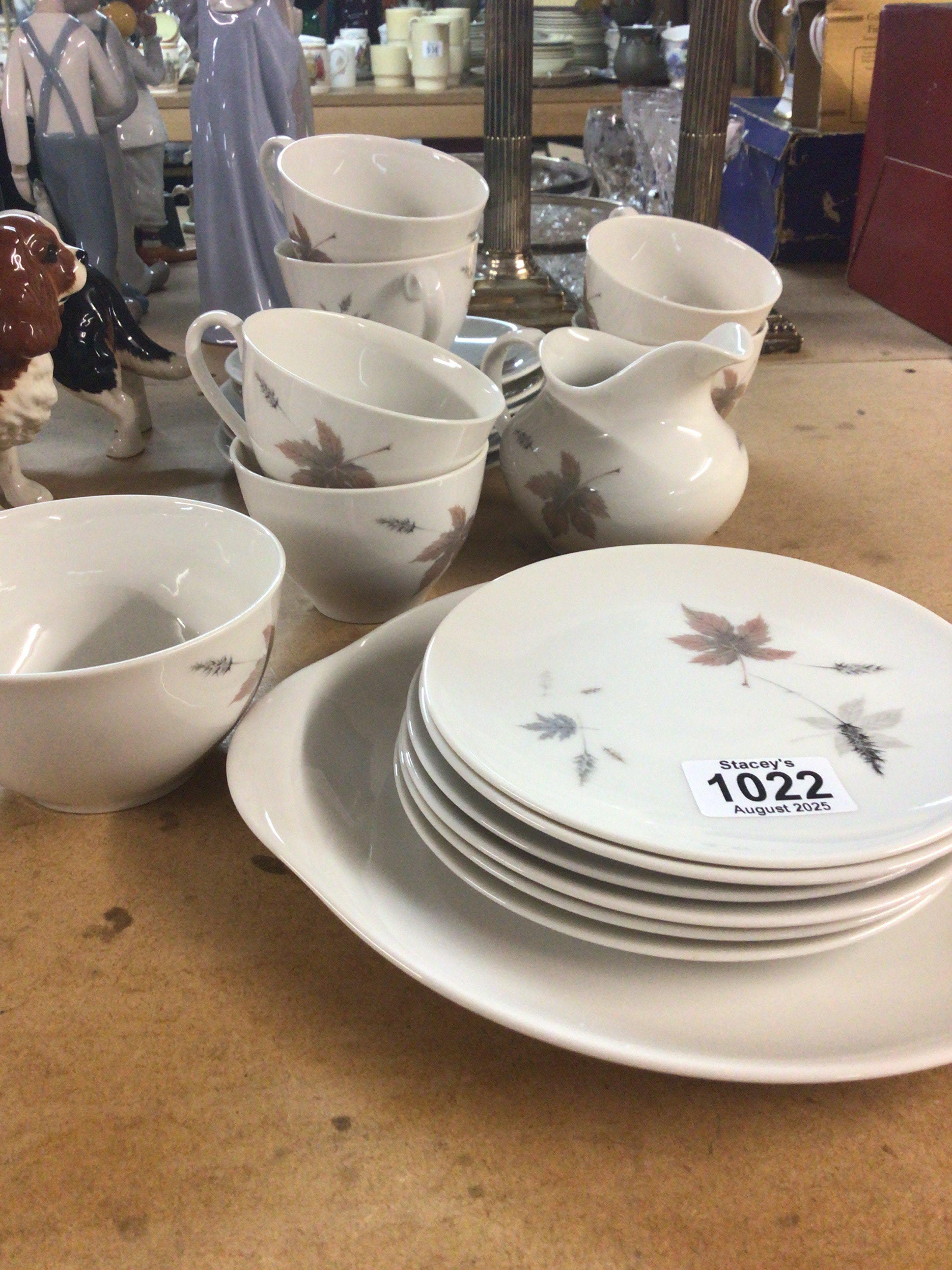 A Royal Doulton Tumbling Leaves pattern six place tea set.