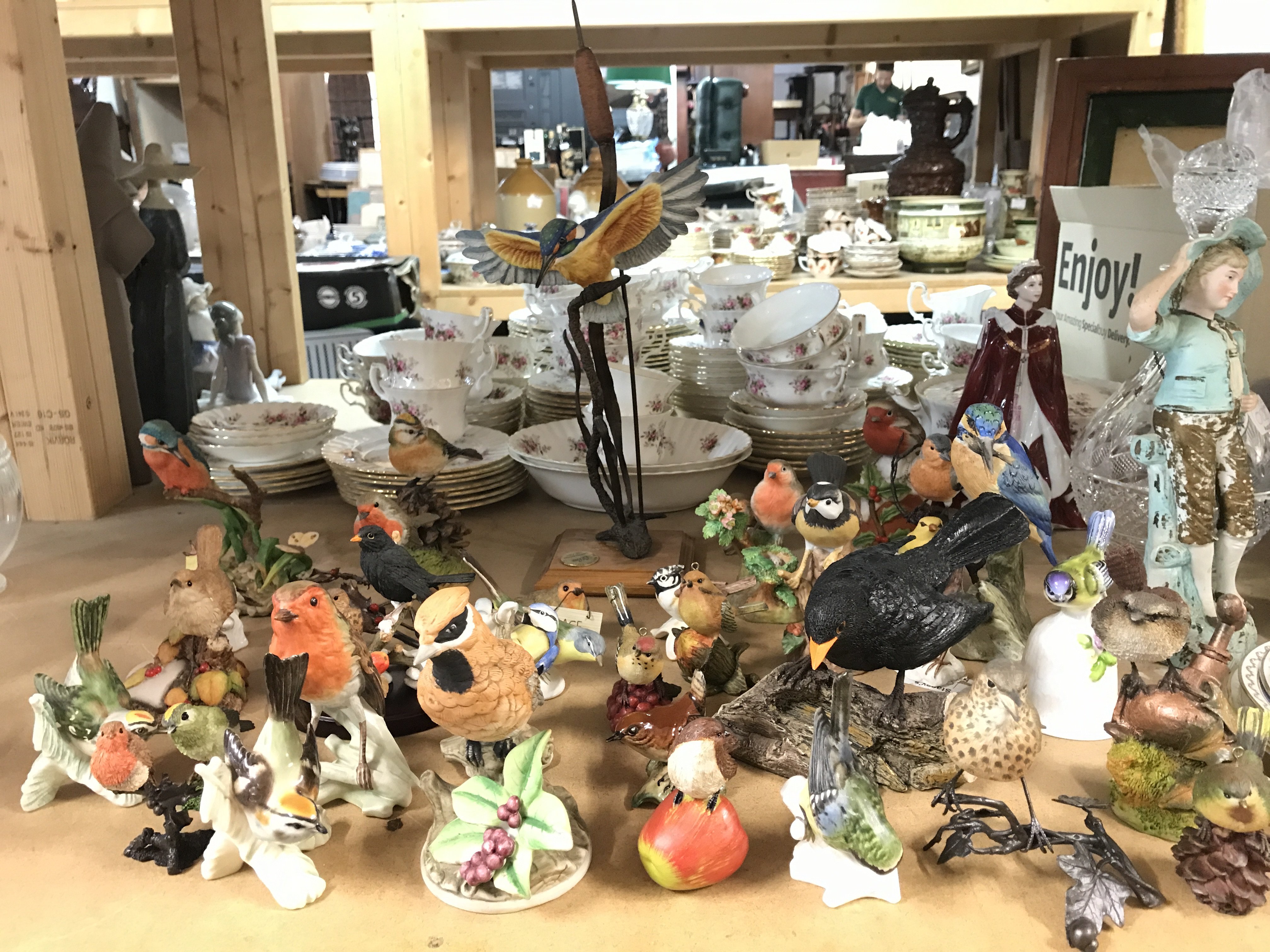 A large collection of bird figures including the Heritage collection, Goebel etc, this lot cannot be posted