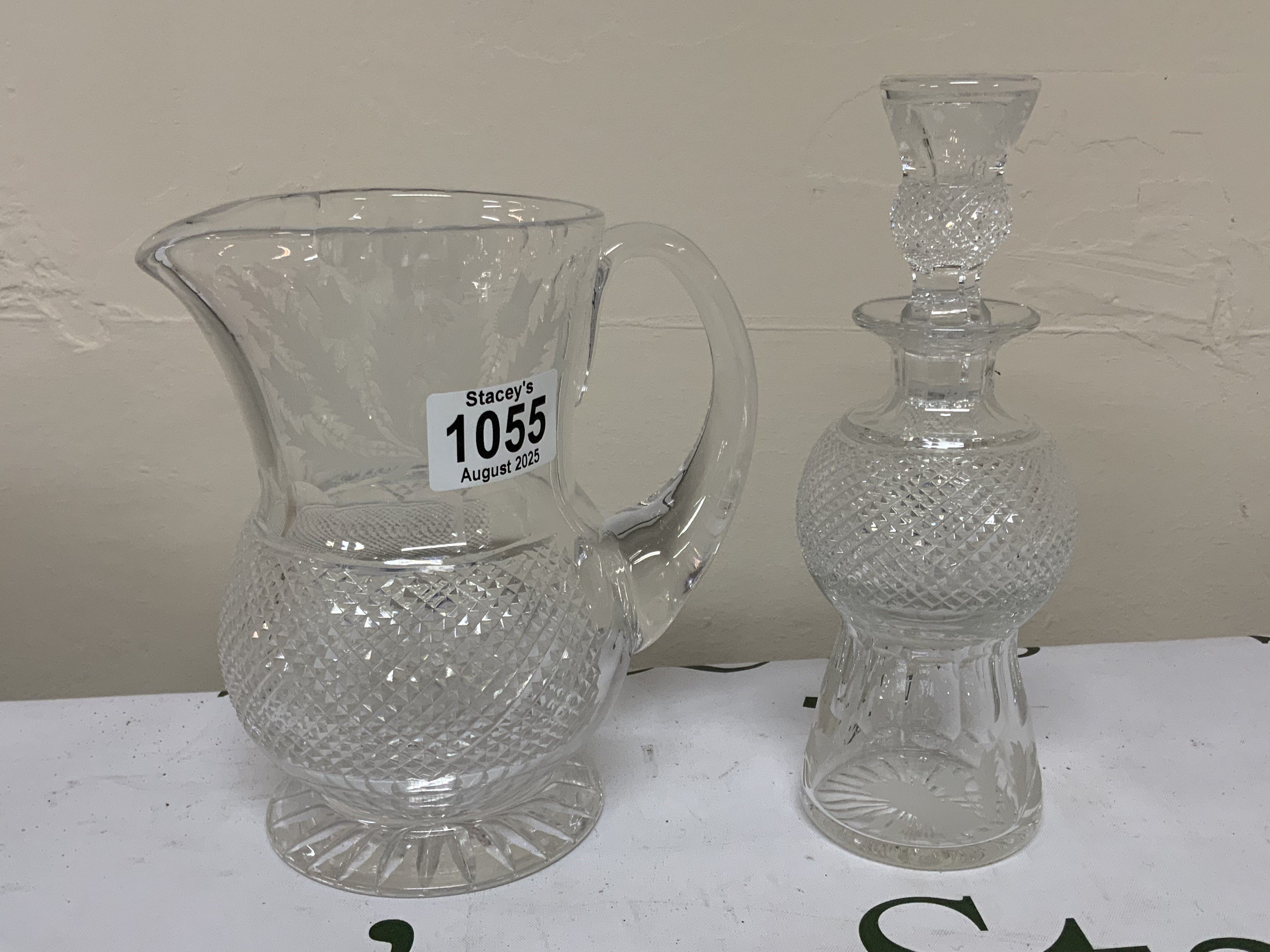 2 Edinburgh crystal items to include a water jug 17.5cm and a small decanter 20cm.