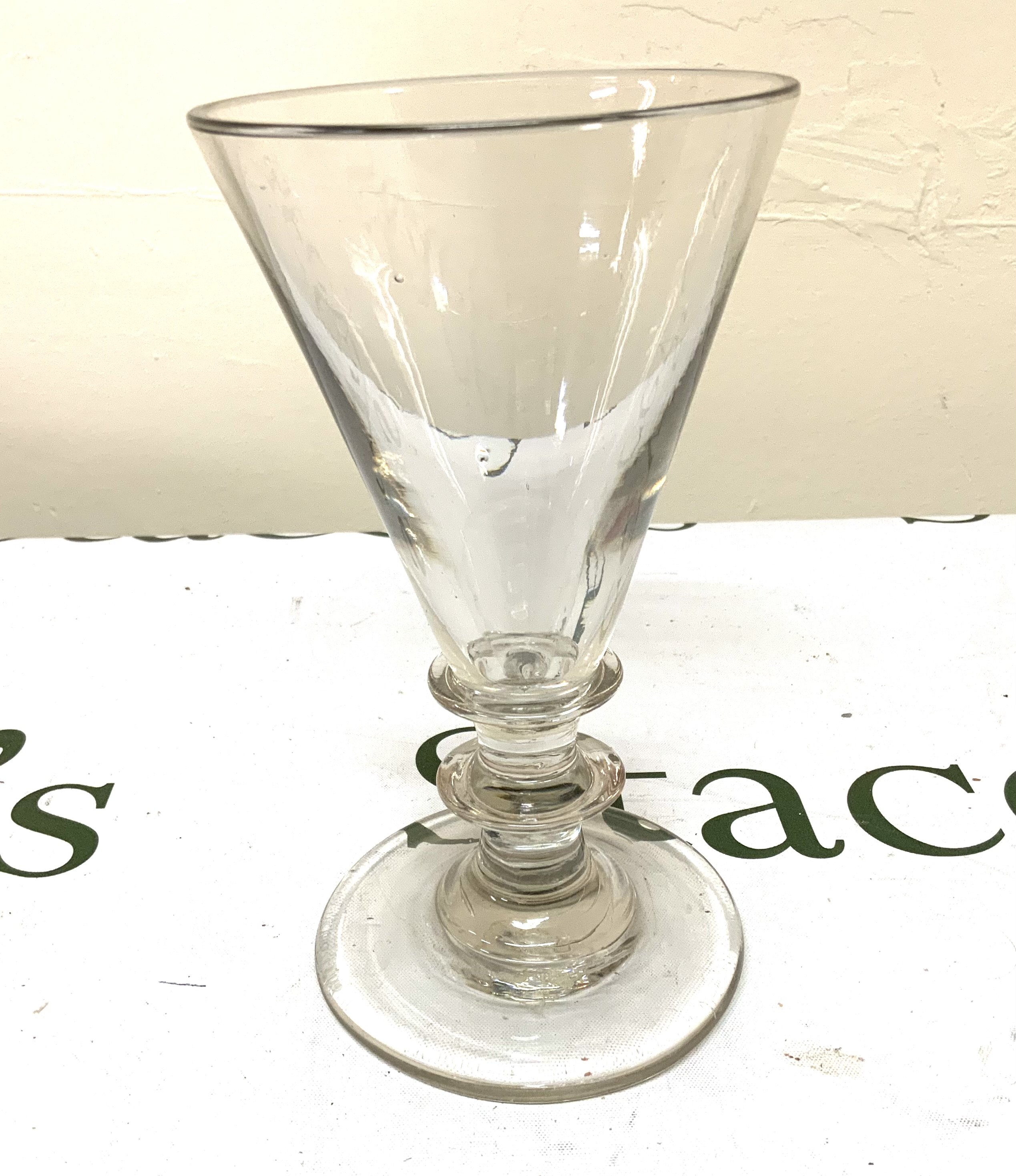 A Victorian conical whisky glass. 18cm.