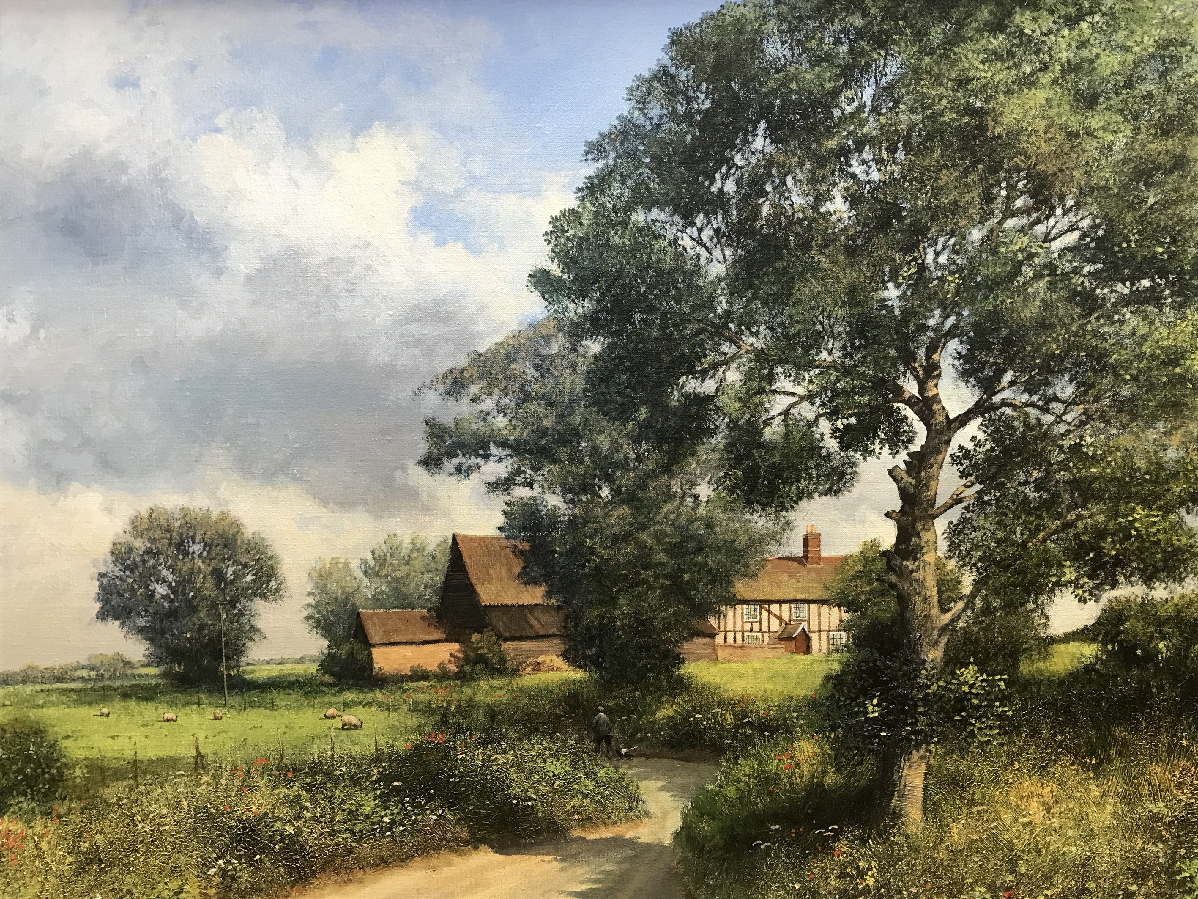 A framed oil painting of a rural landscape by Clive Madgwick (1934-2005) Frame dimensions 92x66cm