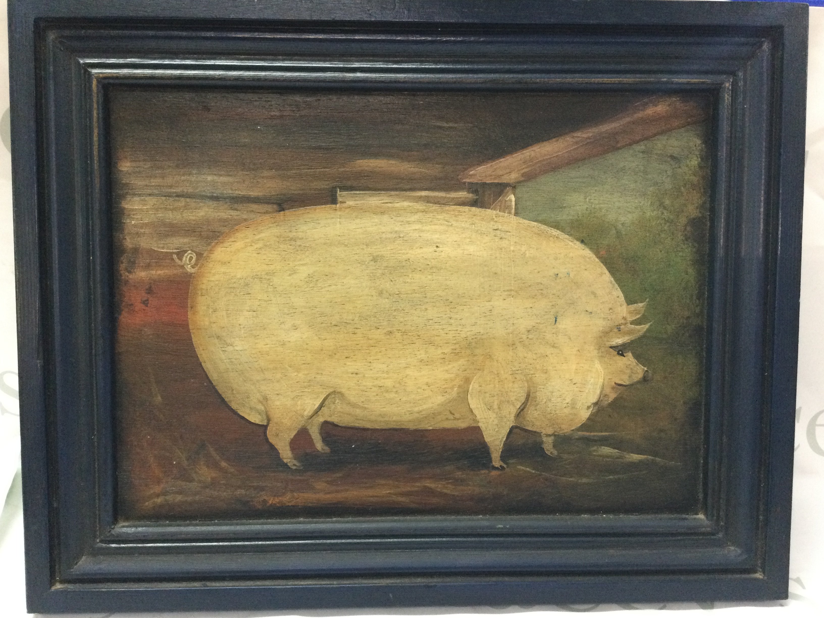 A framed oil painting of a prize pig in landscape. Frame Dimensions 46x36cm
