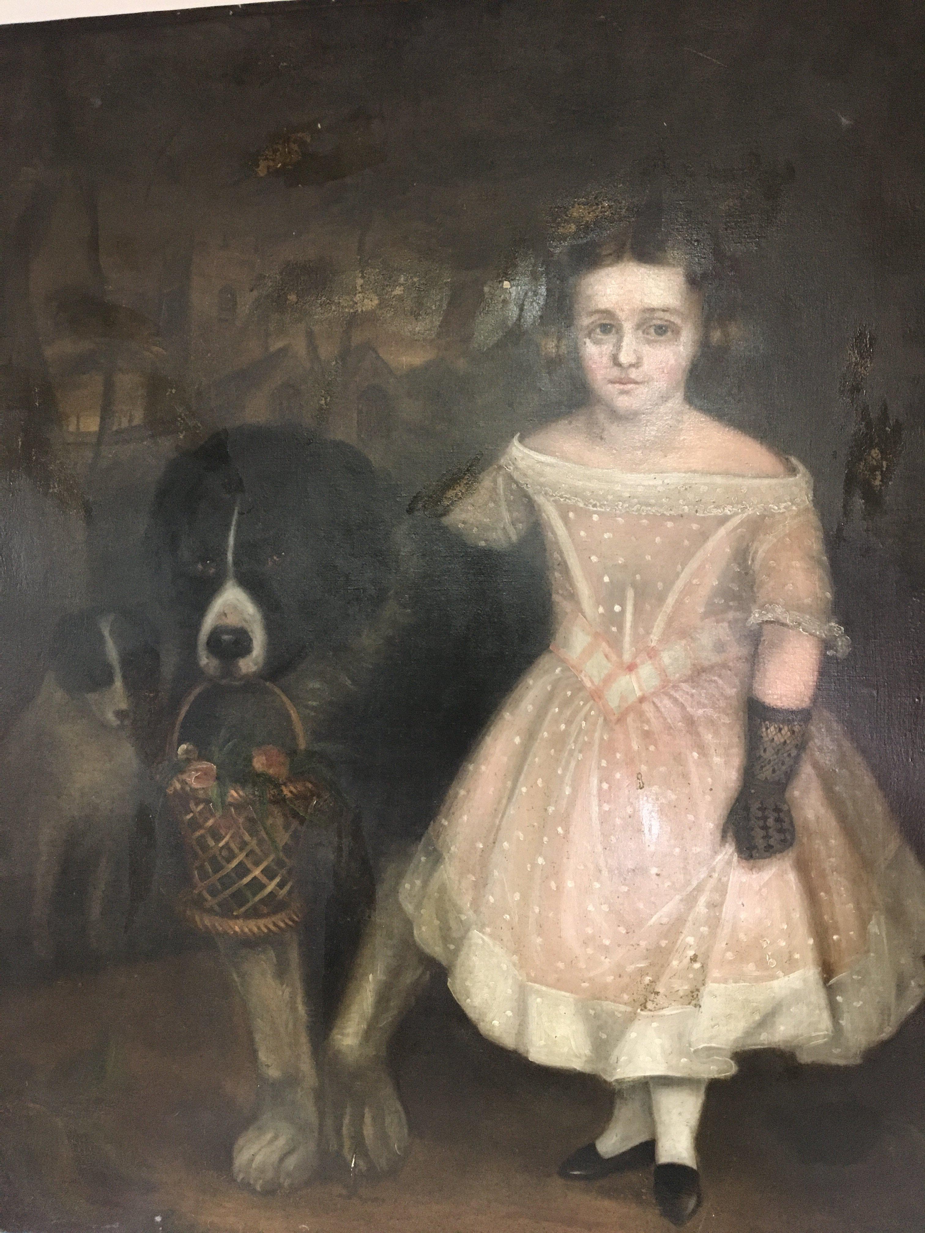 An Early Symbolic Victorian oil painting study of a young girl with Burmese Mountain dog carrying a basket of flowers with other dogs and a church building beyond. Unsigned and unattributed.