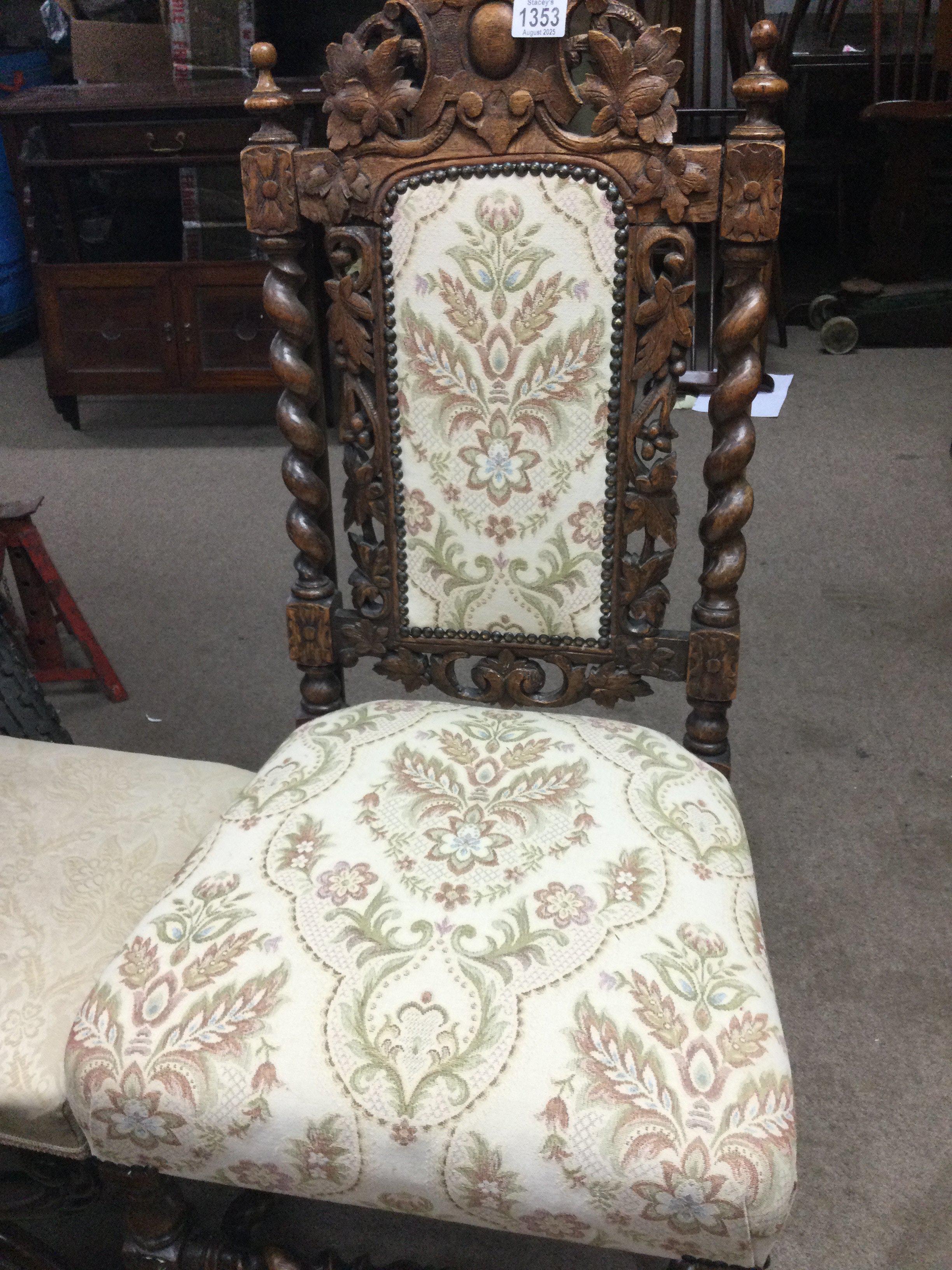 A oak barley twist and carved occasional chair .
