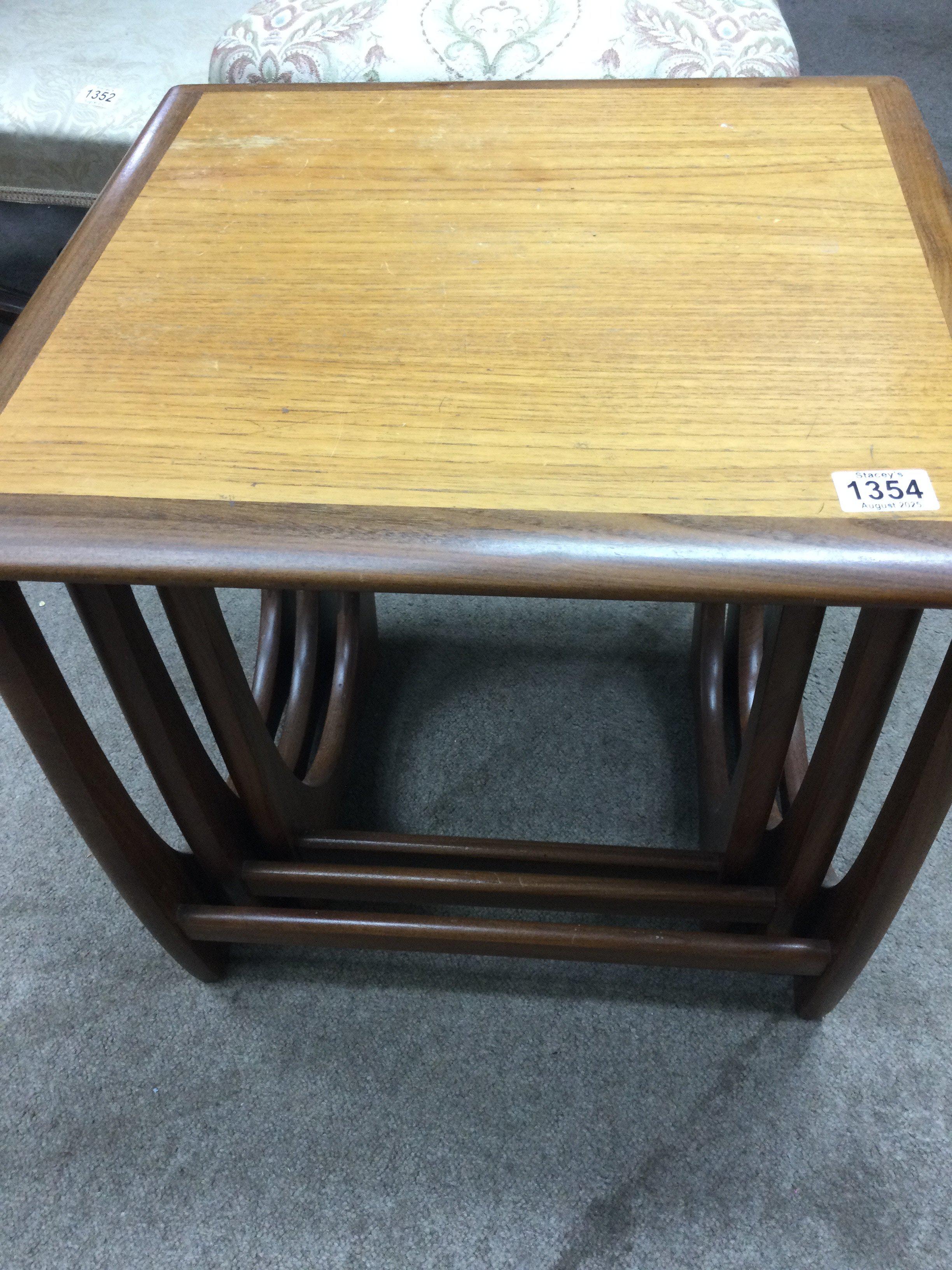 A nest of three G plane tables .