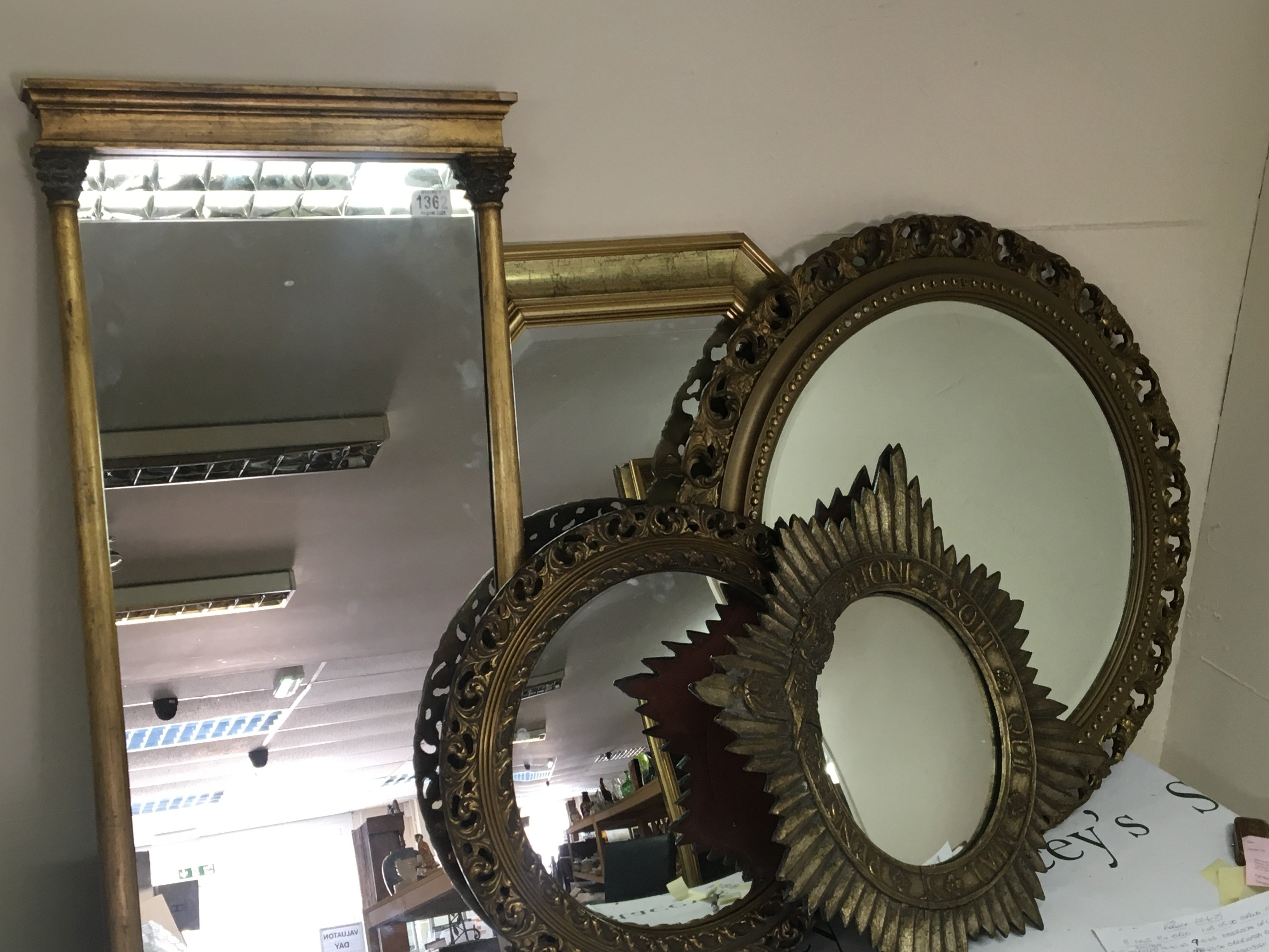A collection of five gilt framed mirrors (5)