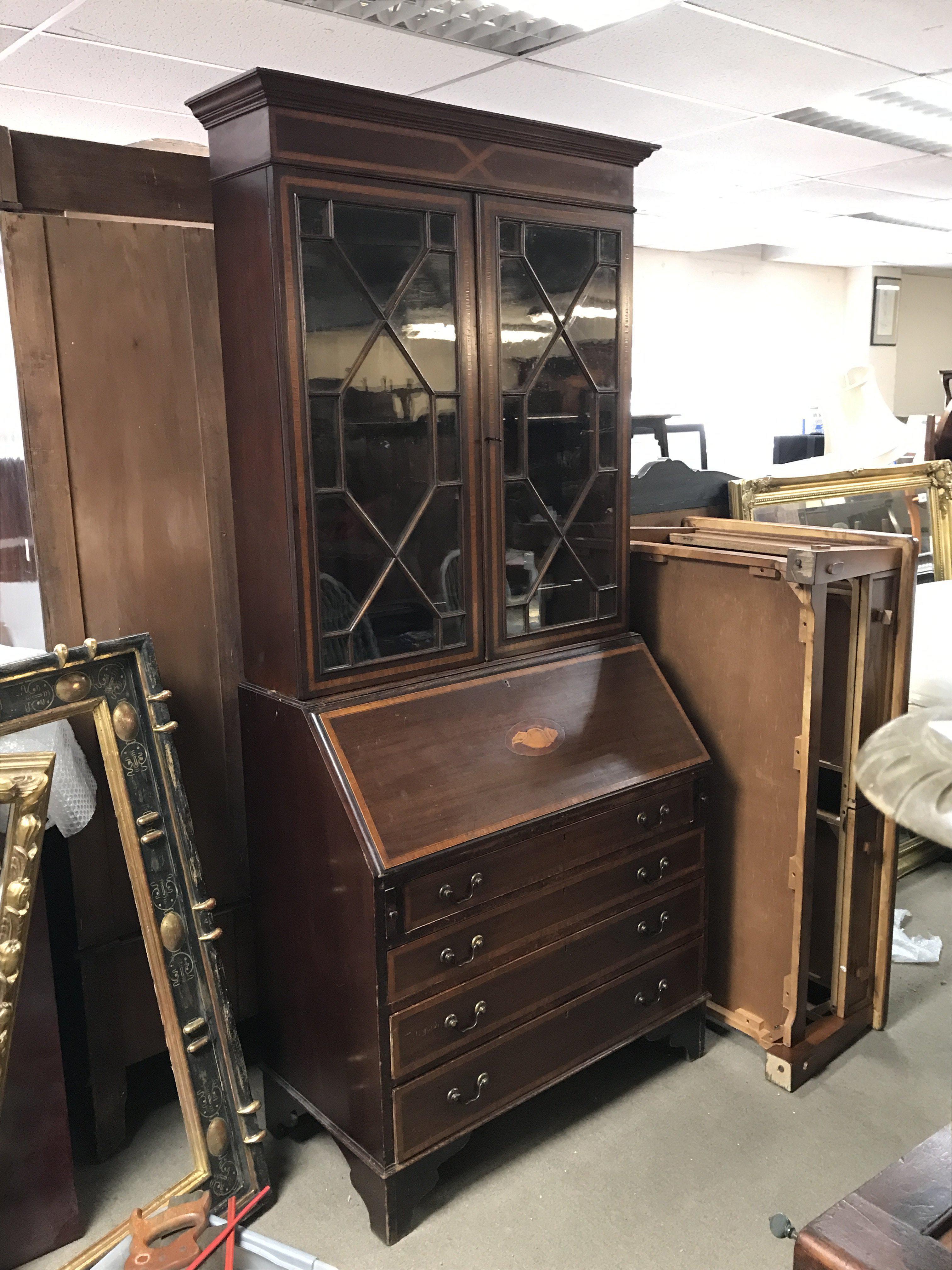 An Edwardian inlaid mahogany bookcase , 204cm tall, 92cm wide