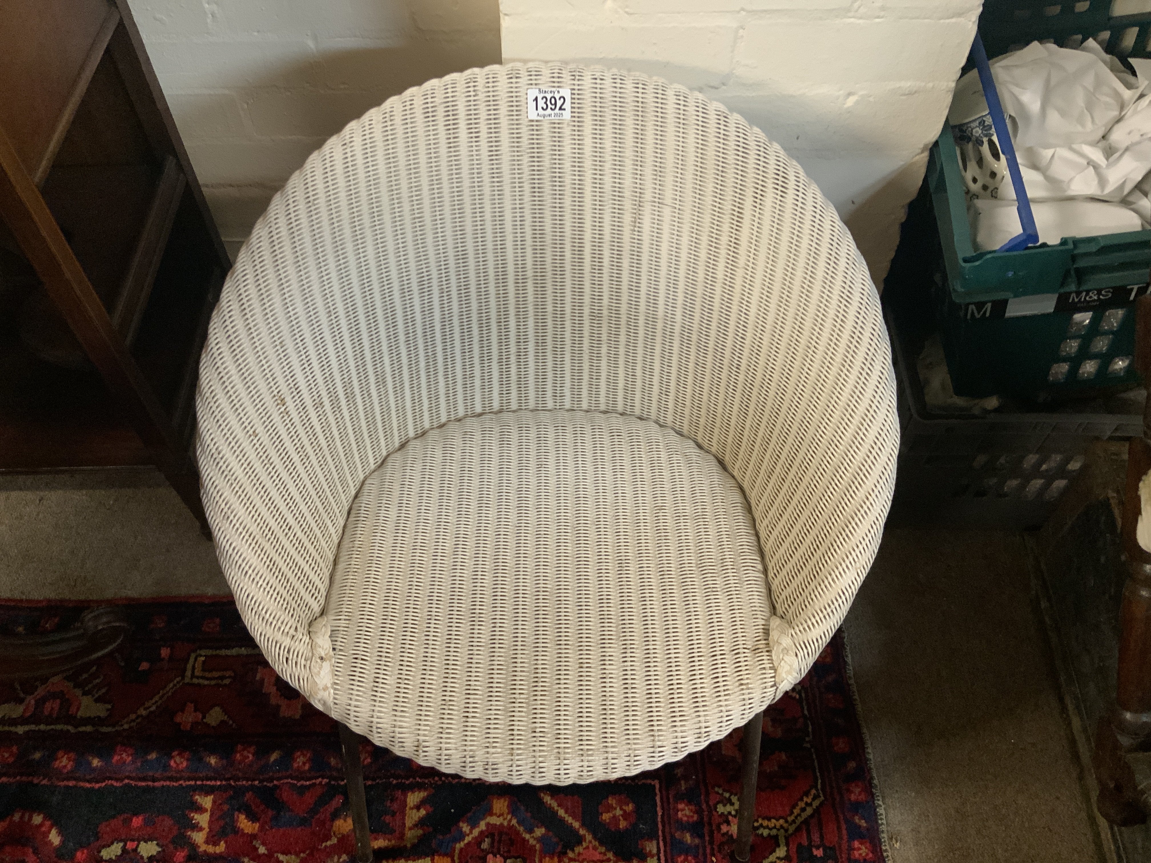 A pair of Lloyd Loom style garden chairs