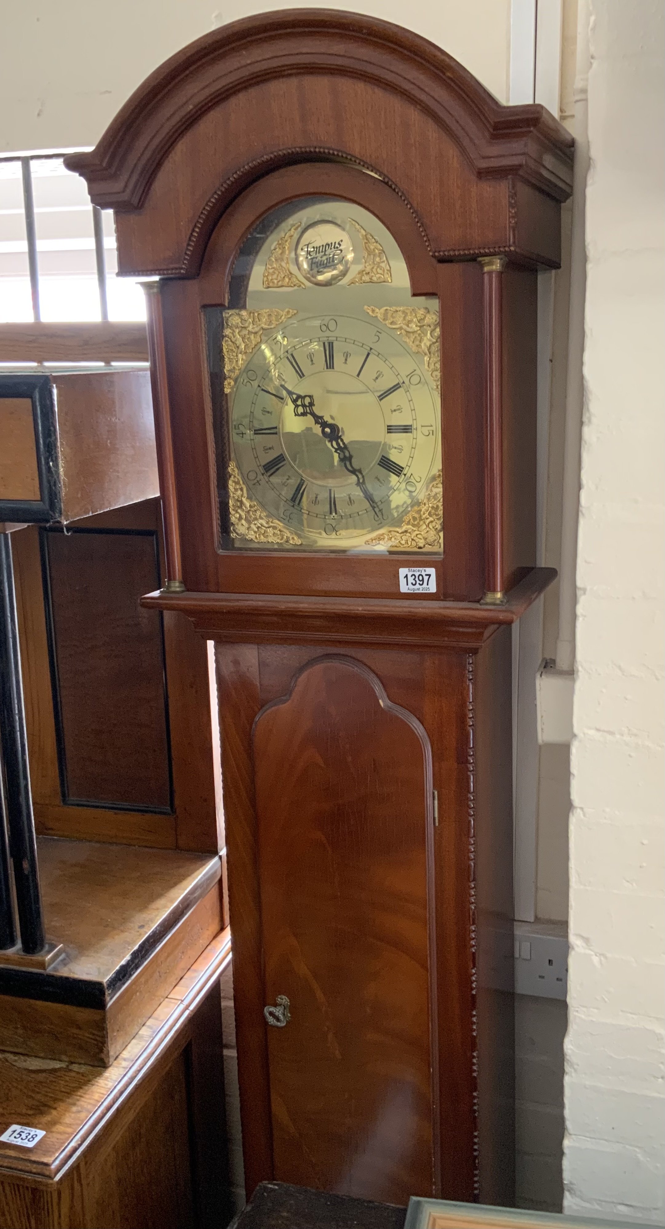 A modern Tempus Fugit brass dial grandfather clock. No reserve.