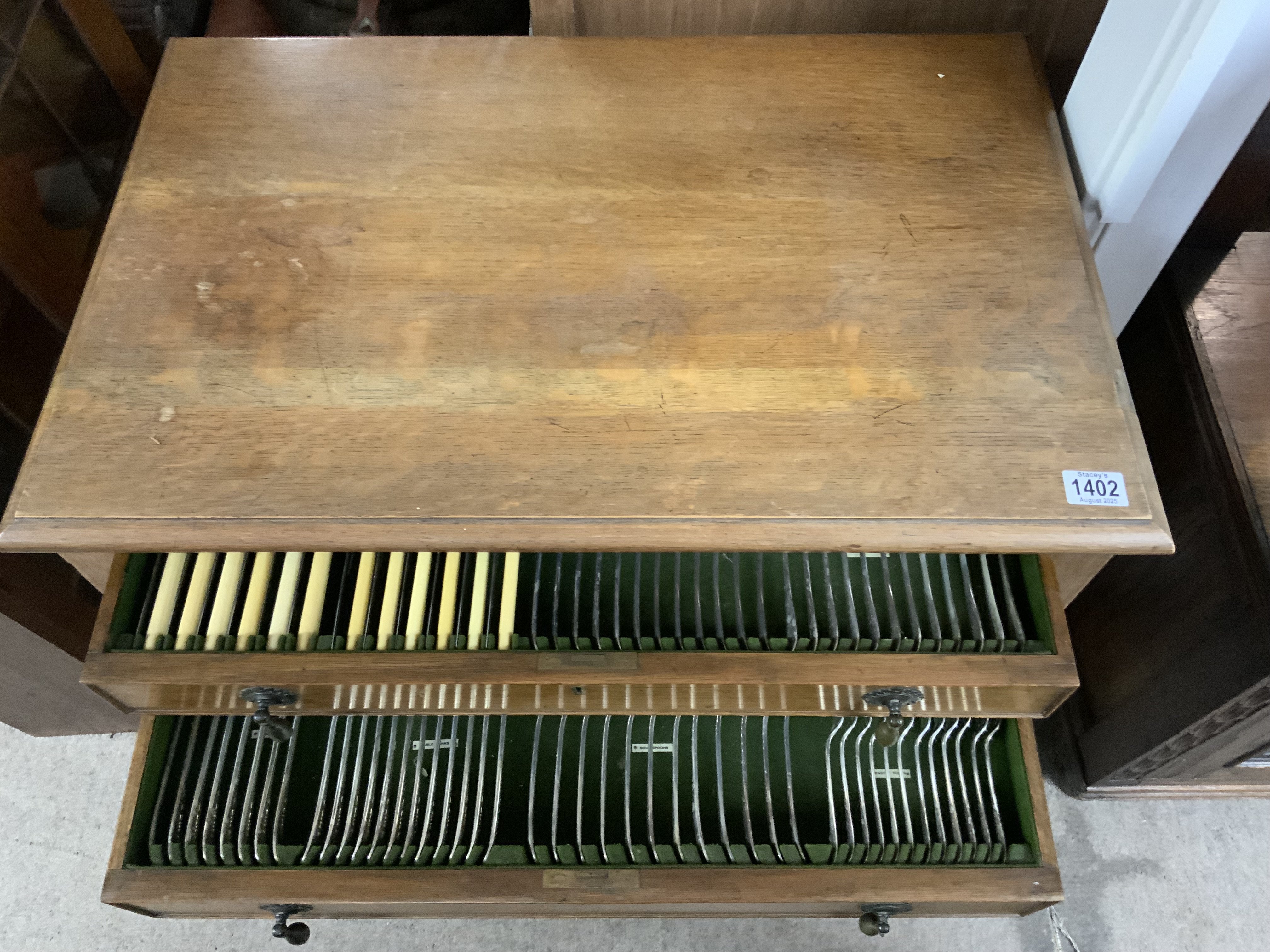 A 3 draw oak canteen, completer with electroplated cutlery. 66cm, x 39.5cm x 80cm (No Reserve).