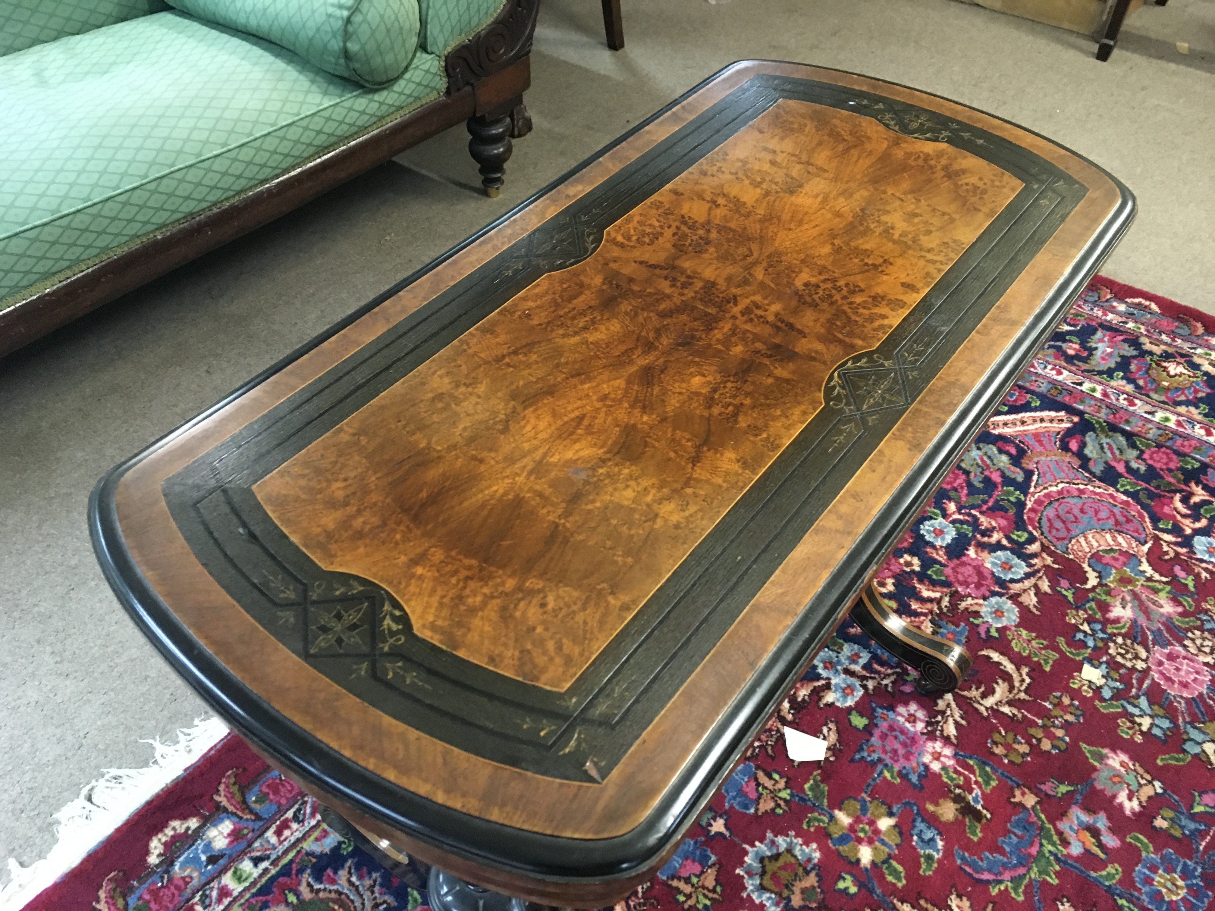 A walnut and ebony inlaid card table 89cm wide 68cm tall
