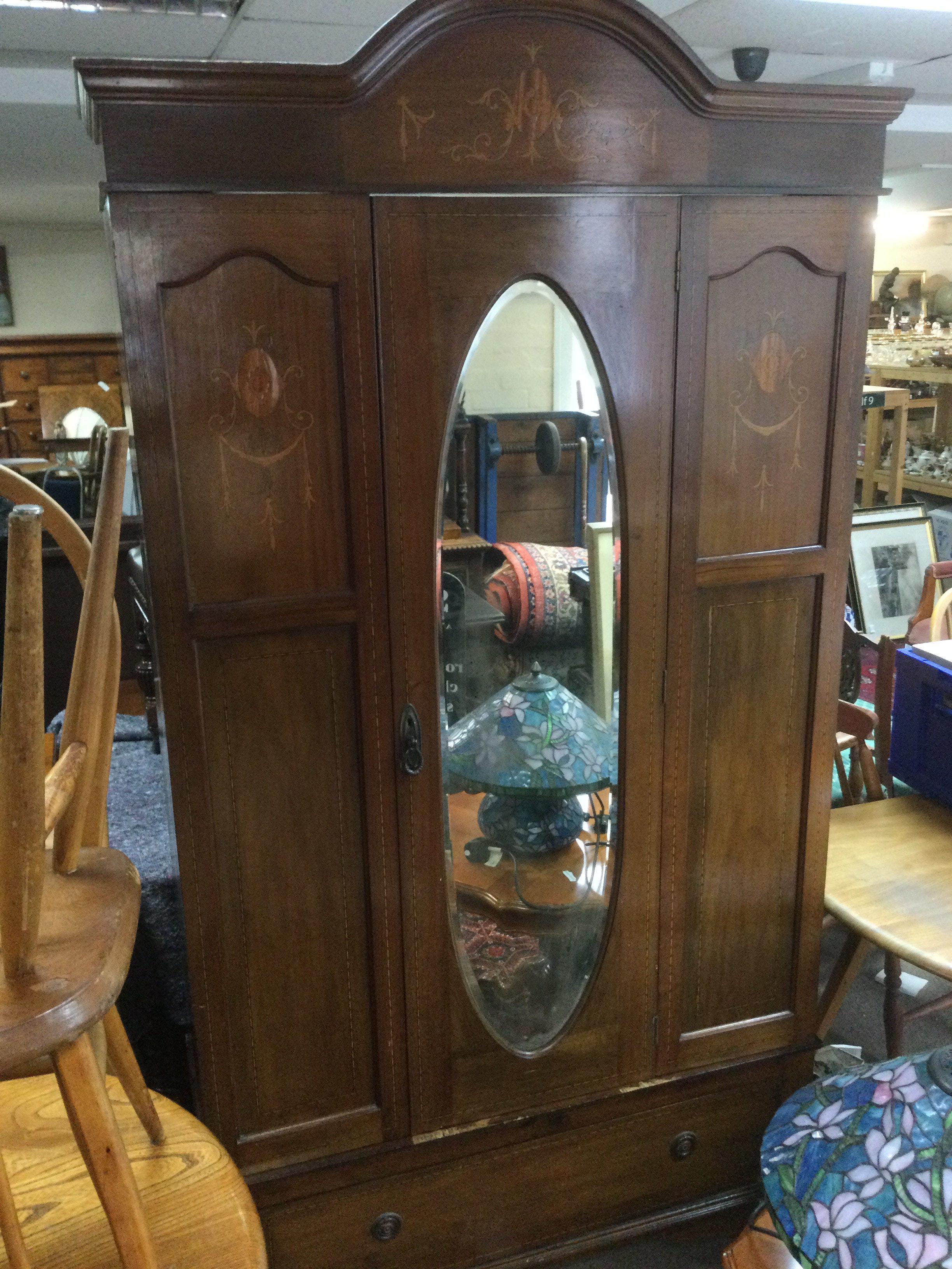 An Edwardian bedroom suite comprising inlaid dressing table, approx 155cm x 90cm x 48cm and single door wardrobe (2). Shipping category D. NO RESERVE