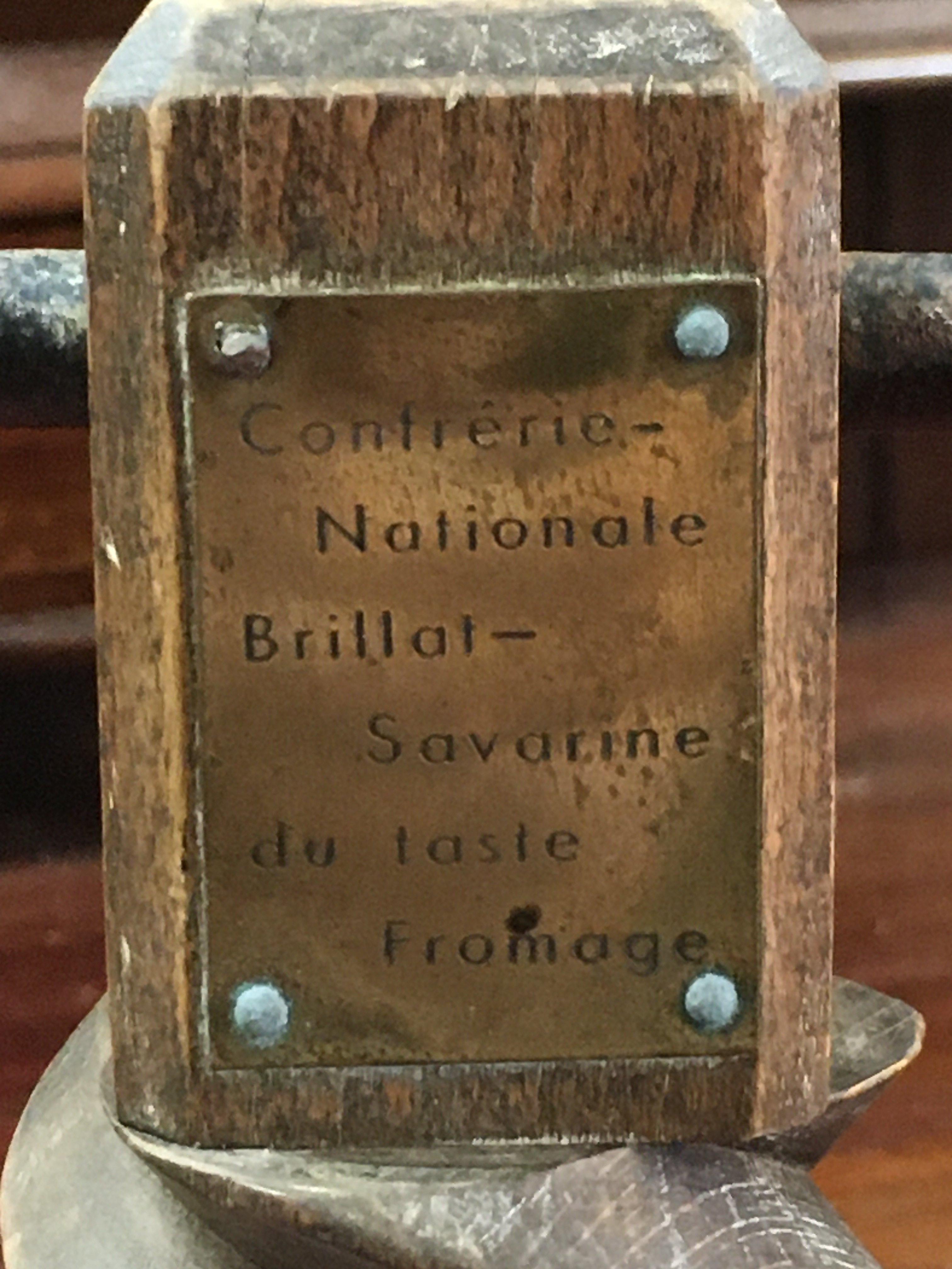 A vintage French Confrerie Nationale competition cheese display stand with interesting engraving around sides- shameful be he who without cheese pretends to pay homage to a good table. 50cm tall