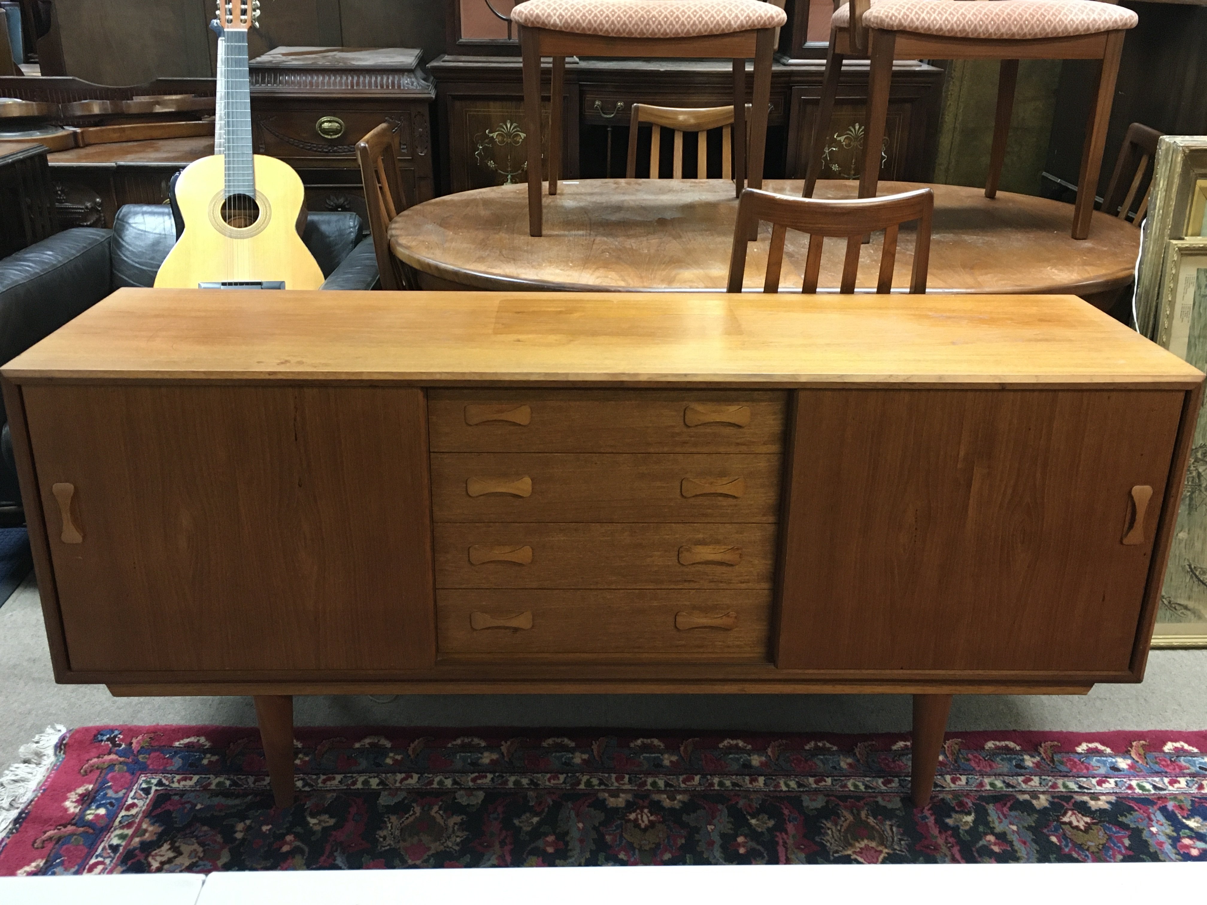 A teak sideboard with sliding doors, dimensions length 45.5x width 160x height 74cm