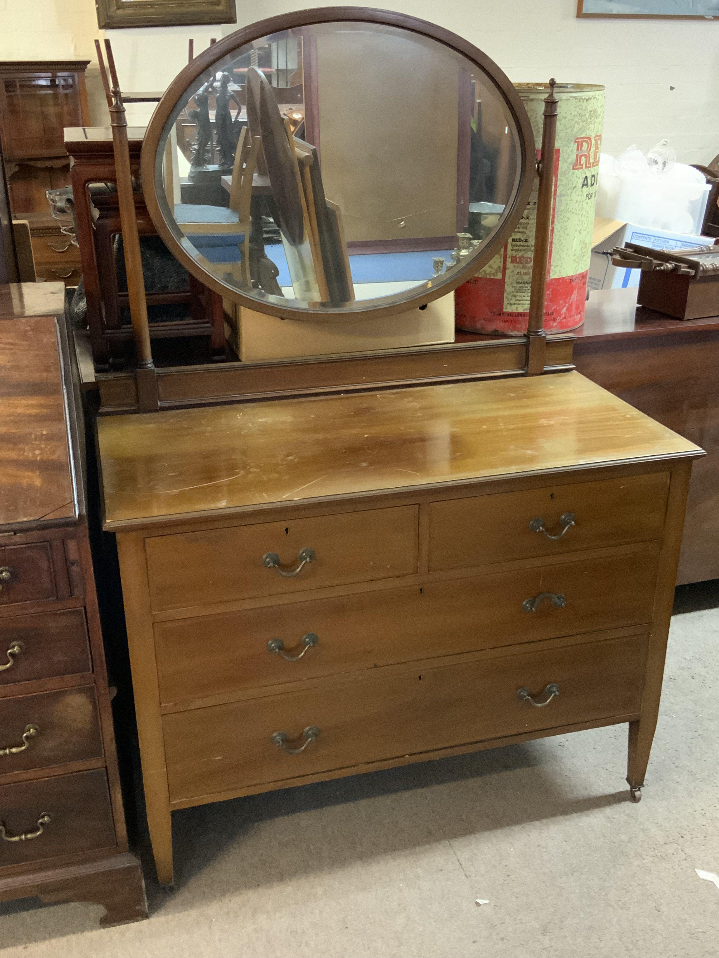 An Edwardian mirror backed dressing table.