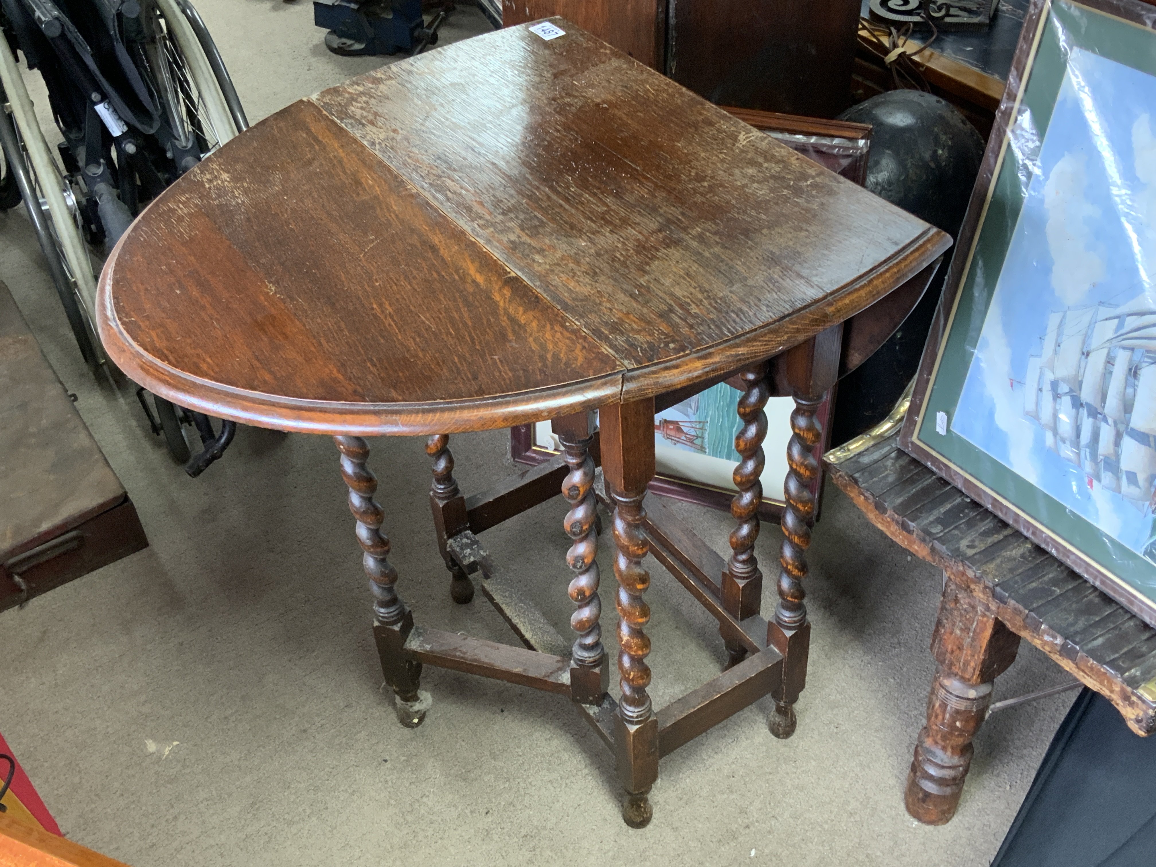 A small oak drop leaf table.