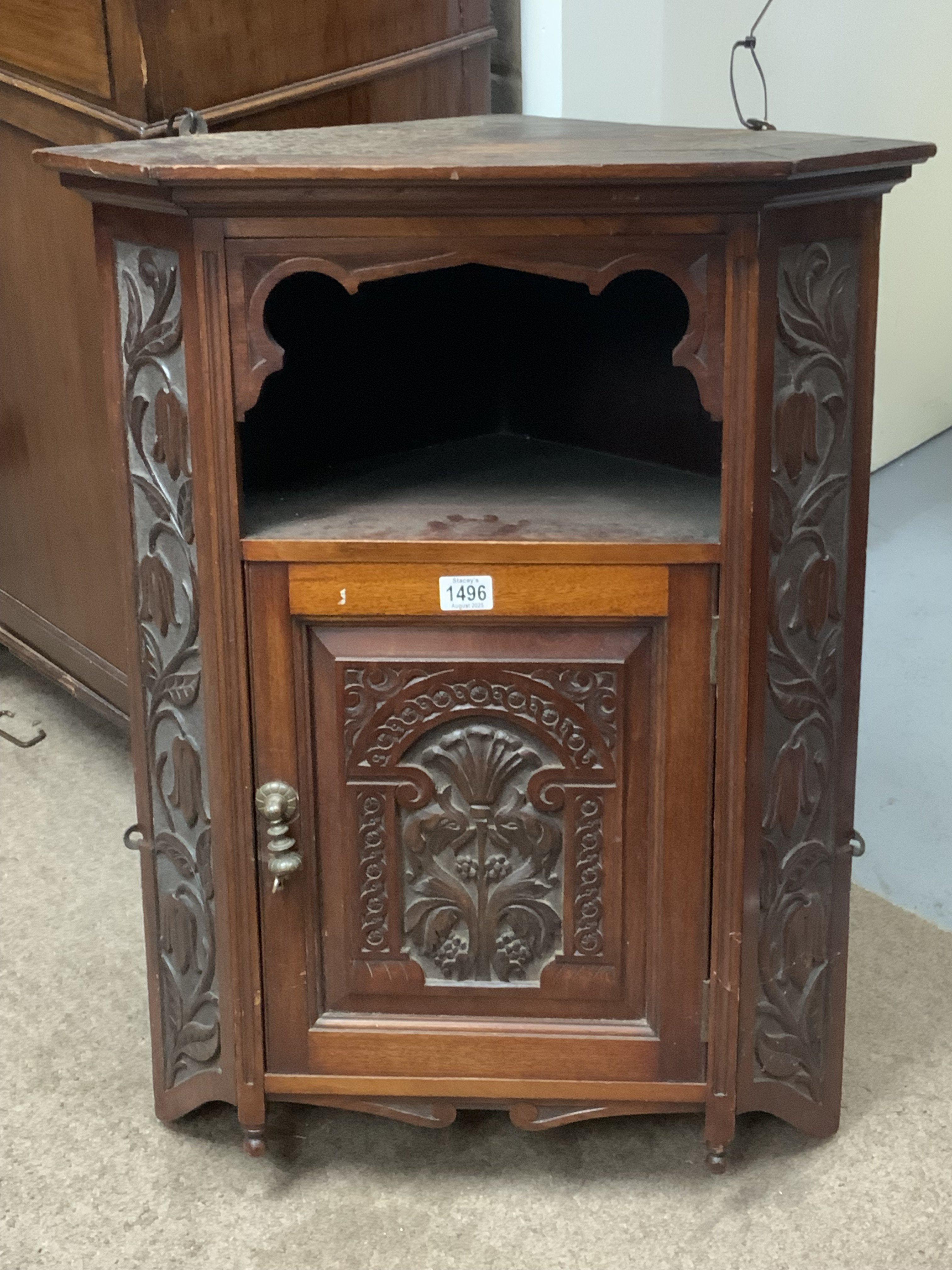 A late Victorian carved corner wall cabinet .82cm x 64cm