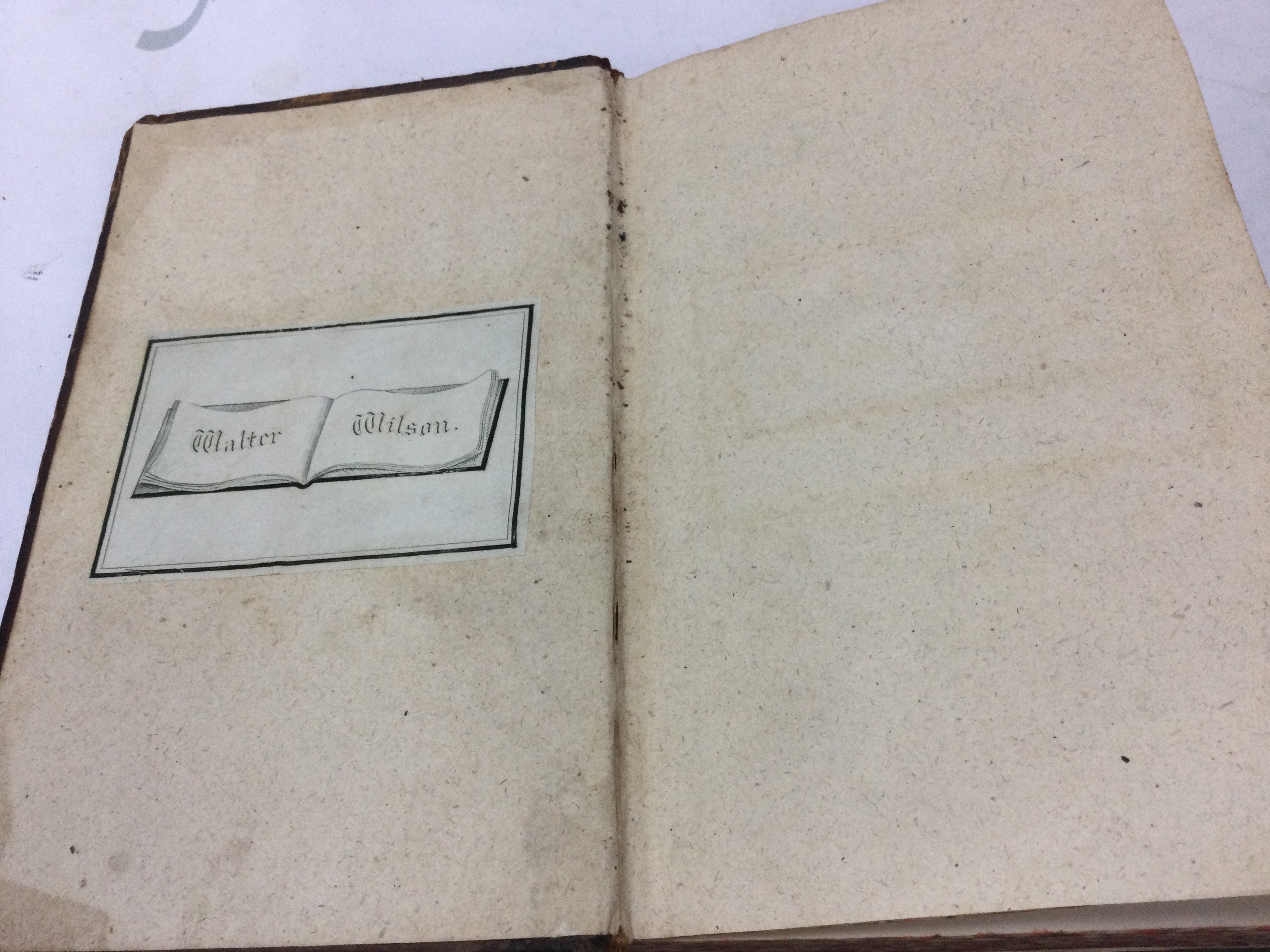 An antique leather bound 1702 History of the last parliament book by James Drake , London. Postage category B- NO RESERVE