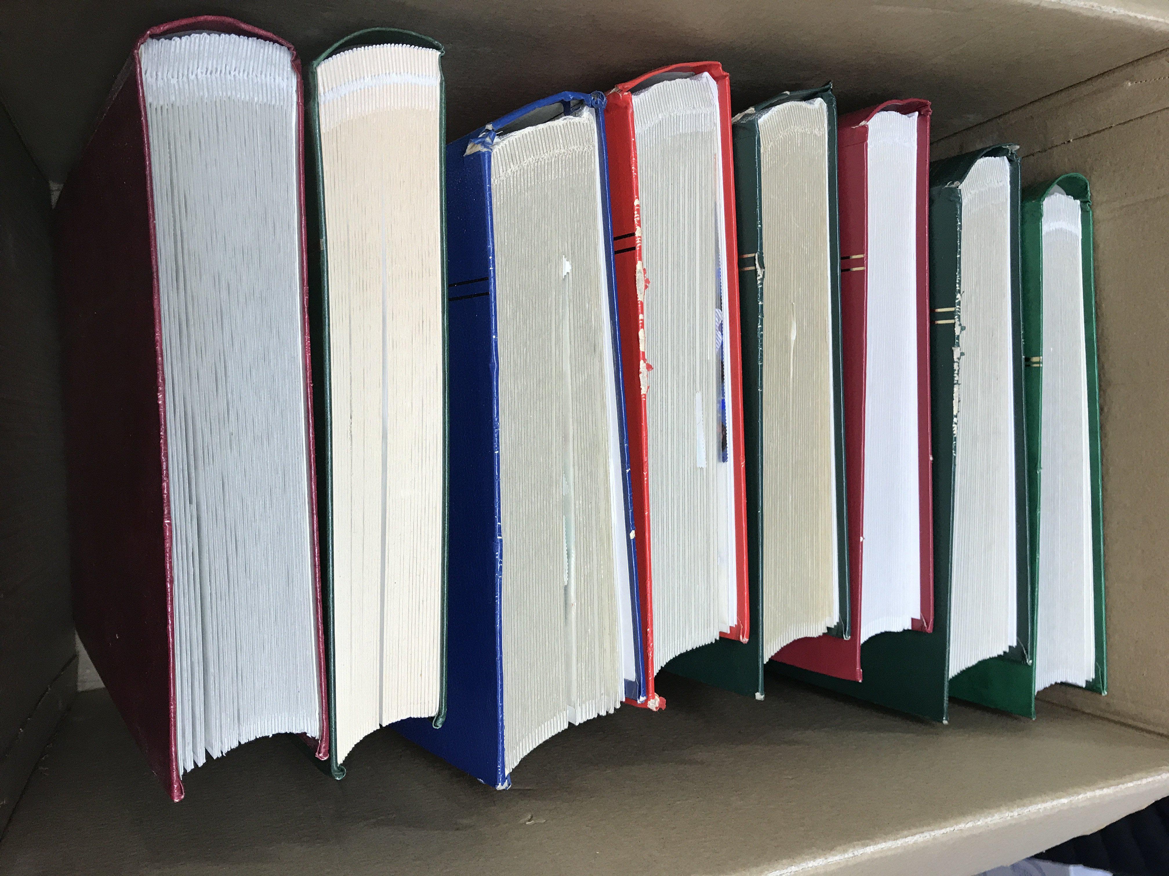 8 Albums of world and commonwealth stamps.