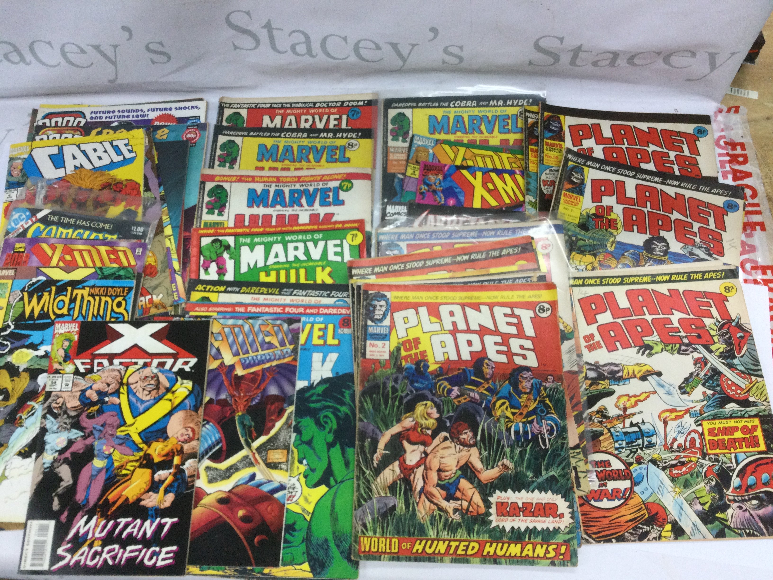 A collection of vintage Marvel comics including a No.2 Planet Of The Apes, Flight magazines plus a small collection of stamps and first day covers. Shipping category D.