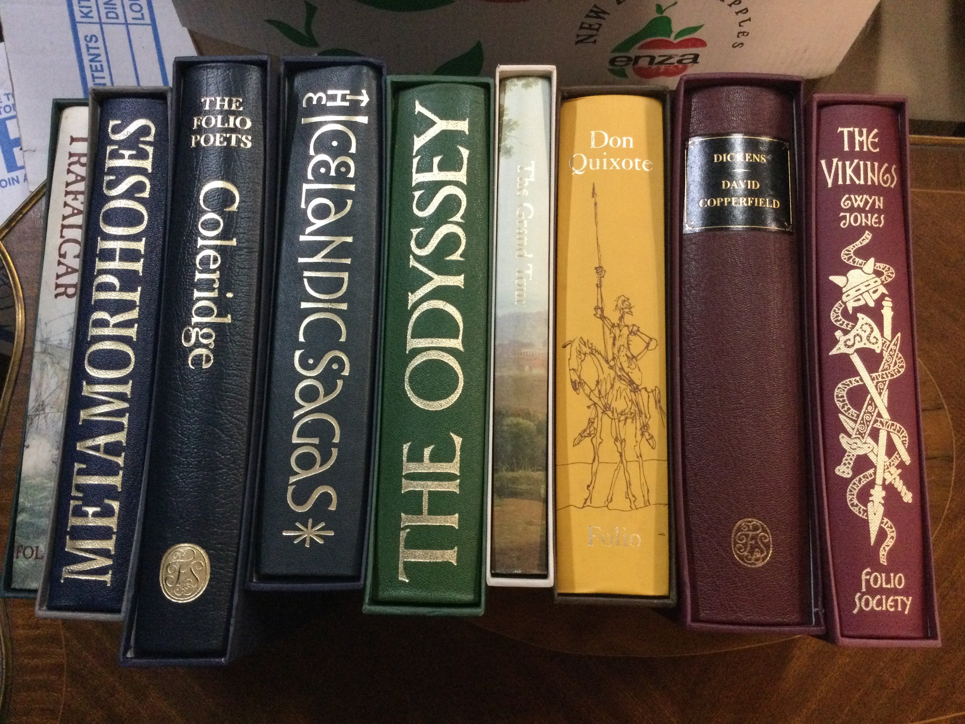A collection of books including Folio Society.