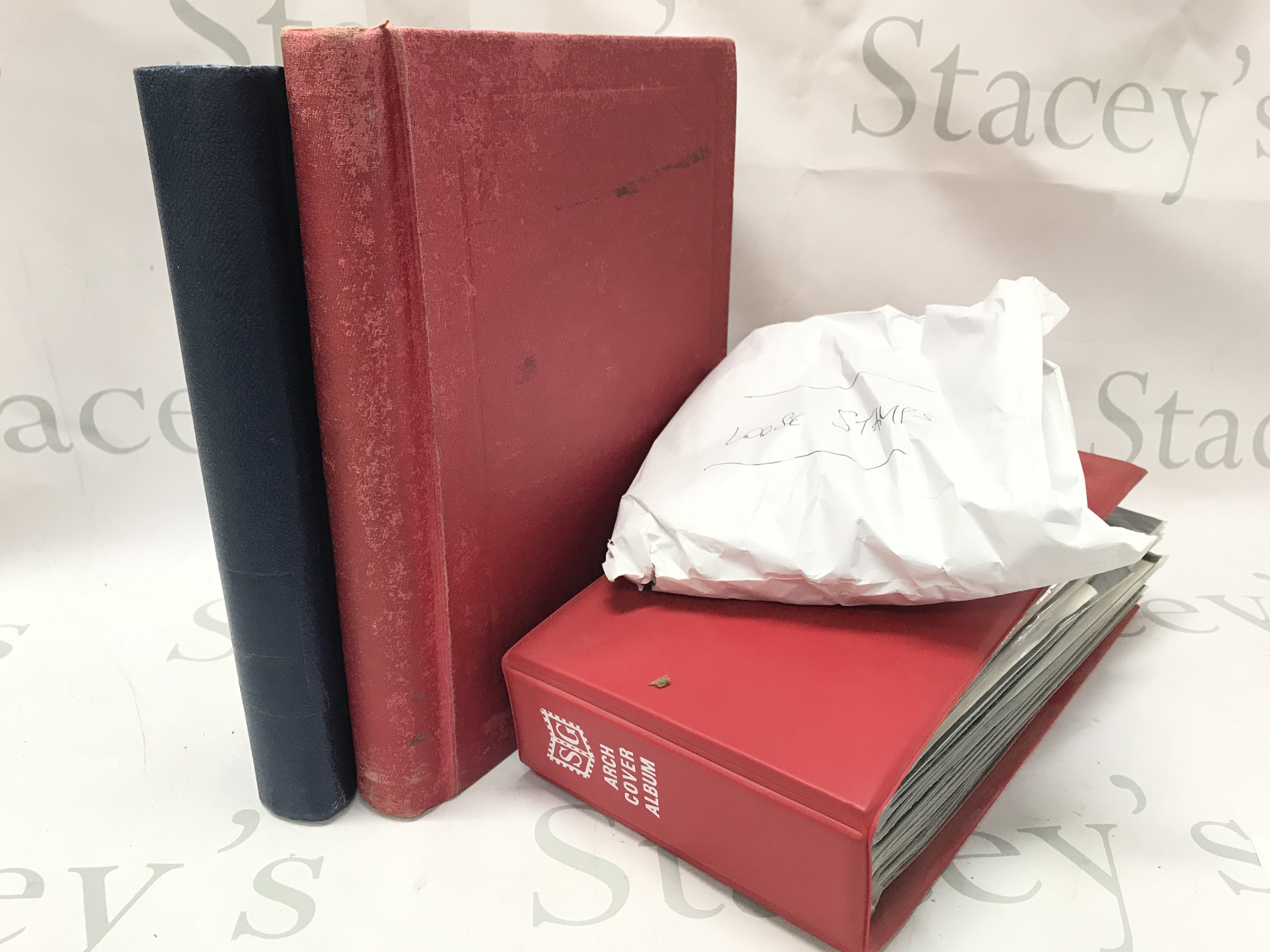 Two stamp albums including used and unused stamps from French colonies, first day cover album and loose stamps