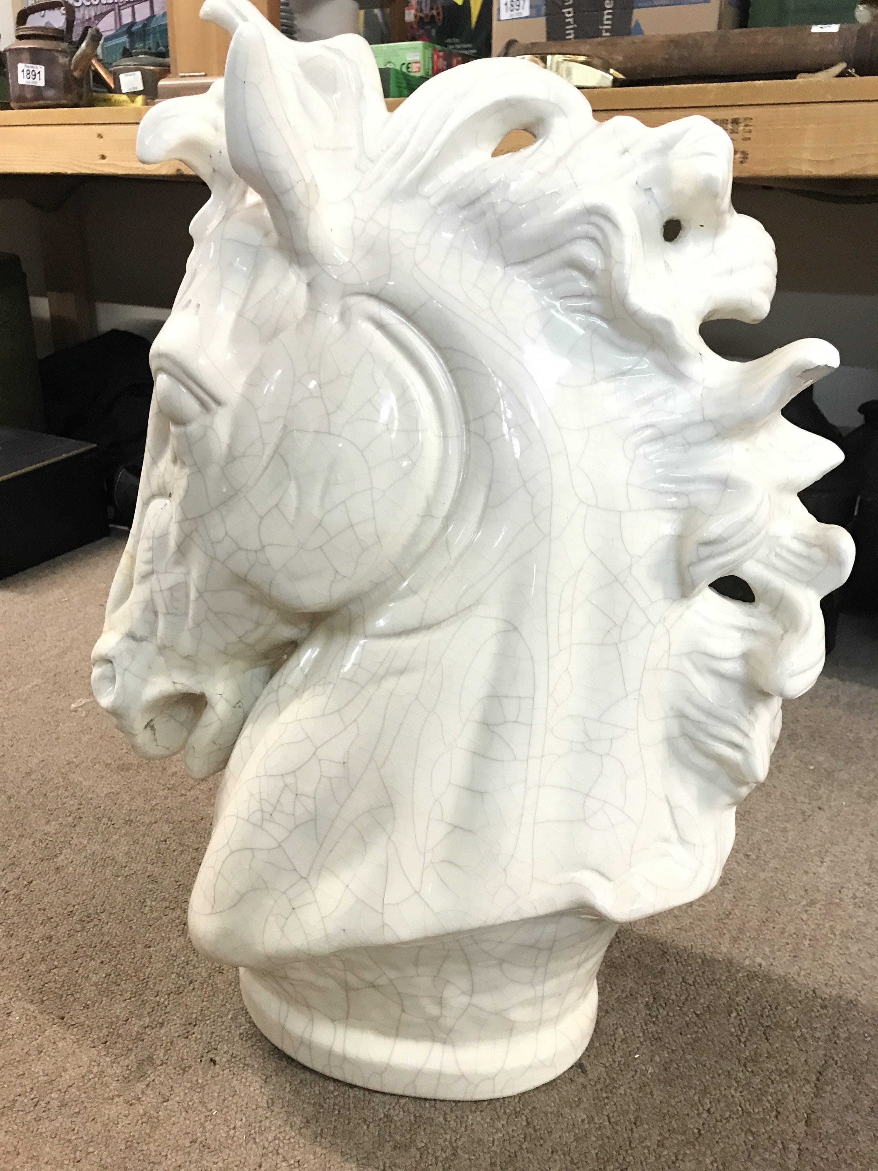 A ceramic horse head sculpture, possibly Italian. with some damage .67cm tall . This lot cannot be posted- NO RESERVE