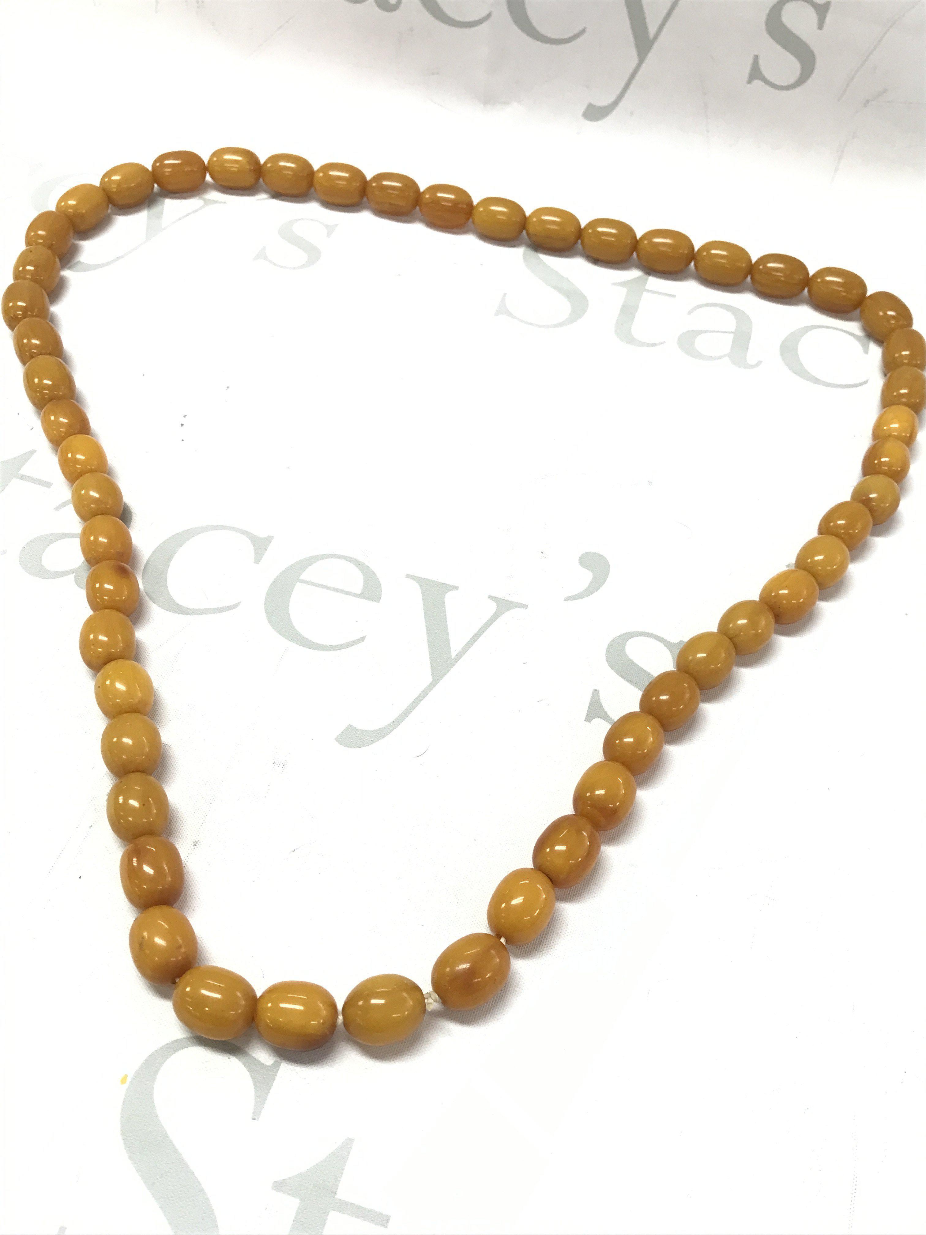 Butterscotch amber colour genuine Bakelite necklace , 108cm 210g . Postage category A